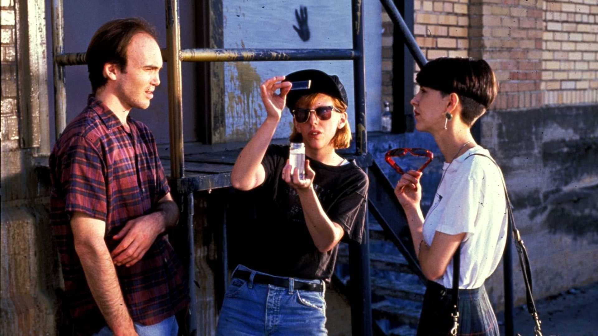 Cinematic background from Slacker 1990 - Austin, Texas, is an Eden for the young and unambitious, from the enthusiastically eccentric to the dangerously apathetic. Here, the nobly lazy can eschew responsibility in favor of nursing their esoteric obsessions. The locals include a backseat philosopher who passionately expounds on his dream theories to a seemingly comatose cabbie, a young woman who tries to hawk Madonna's Pap test to anyone who will listen and a kindly old anarchist looking for recruits.