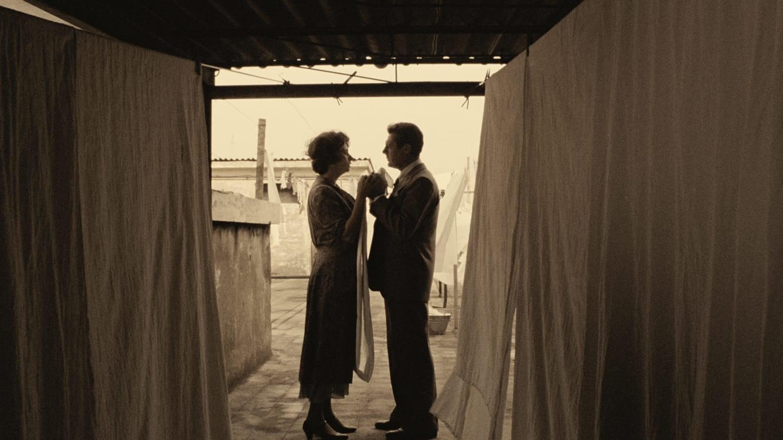 Cinematic background from A Special Day 1977 - In Rome, fascist supporter Emanuele attends a parade commemorating Adolf Hitler's historic meeting with Italian leader Benito Mussolini, leaving his apolitical wife, Antonietta, to tend to household duties. Antonietta encounters a man, Gabriele, who appears surprisingly nonplussed by the political event. Over the course of the day, the two forge a close friendship that will forever change their perceptions of life, love and politics.