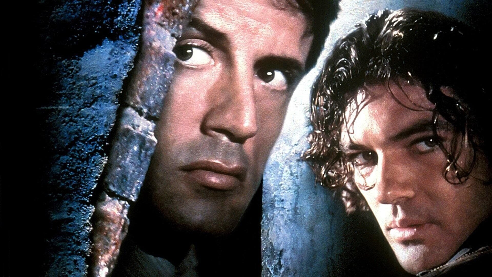 Cinematic background from Assassins 1995 - Assassin Robert Rath arrives at a funeral to kill a prominent mobster, only to witness a rival hired gun complete the job for him -- with grisly results. Horrified by the murder of innocent bystanders, Rath decides to take one last job and then return to civilian life. But finding his way out of the world of contract killing grows ever more dangerous as Rath falls for his female target and becomes a marked man himself.