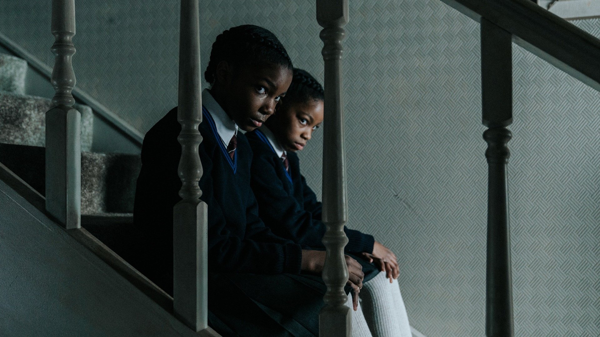 Cinematic background from The Silent Twins 2022 - Feeling isolated from that unwelcoming community, June and Jennifer Gibbons turn inward and reject communication with everyone but each other, retreating into their own fantasy world of artistic inspiration and adolescent desires.