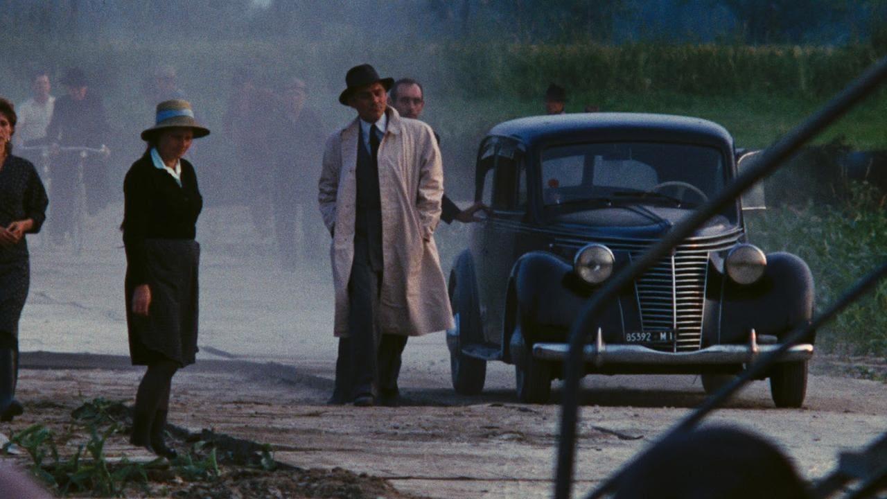 Cinematic background from The Mattei Affair 1972 - Enrico Mattei helped change Italy’s future, first as freedom-fighter against the Nazis, then as an investor in methane gas through a public company, A.G.I.P., and ultimately as the head of ENI, a state body formed for the development of oil resources. On October 27, 1962, he died when his private airplane crashed during a flight to Milan. Officially, it is declared an accident, but many journalists explore other plausible reasons for Mattei's untimely death.