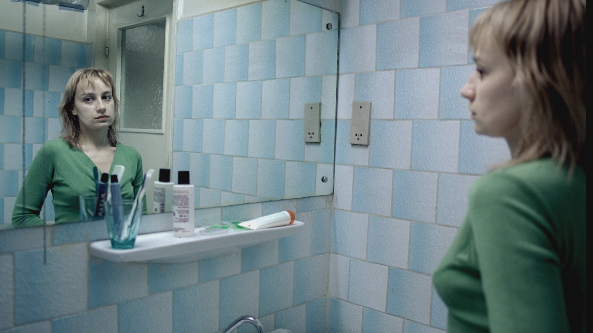 Cinematic background from 4 Months, 3 Weeks and 2 Days 2007 - Two college roommates have 24 hours to make the ultimate choice as they finalize arrangements for a black market abortion.