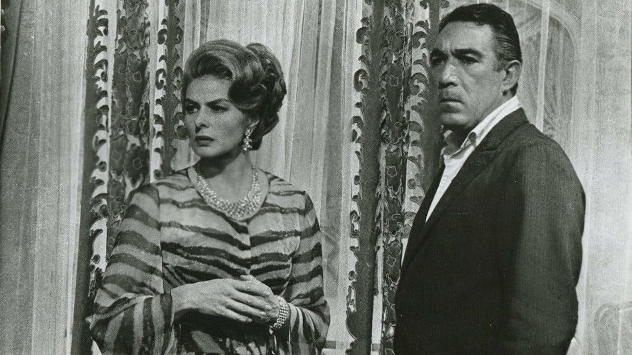 Cinematic background from The Visit 1964 - Carla Zachanassian had a child by Serge Miller as a teenager. When Serge refused to marry her, she was driven out of town. By her own wit and cunning, she has returned as a multi-millionaire for a visit. The town lays out the red carpet expecting big things from Carla, only to learn that her sole purpose is to see Serge Miller killed...