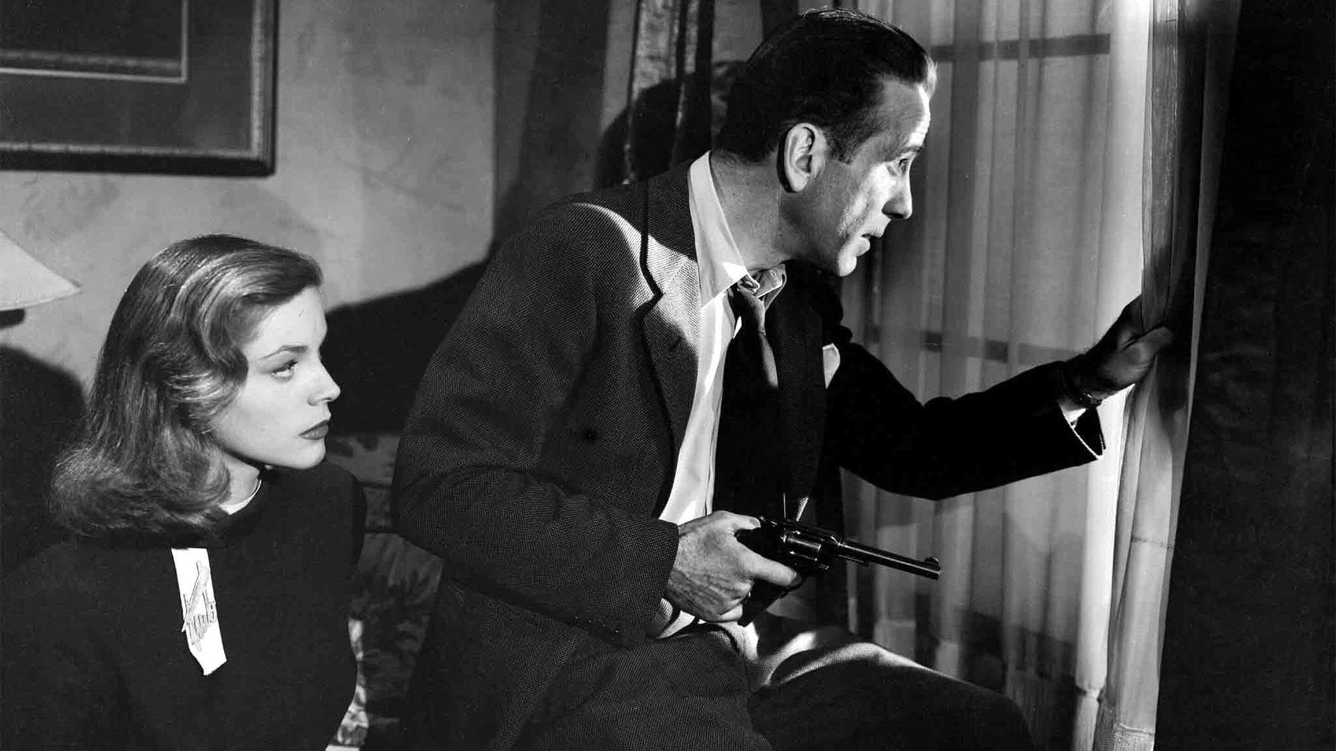 Cinematic background from The Big Sleep 1946 - Private Investigator Philip Marlowe is hired by wealthy General Sternwood regarding a matter involving his youngest daughter Carmen. Before the complex case is over, Marlowe sees murder, blackmail, deception, and what might be love.