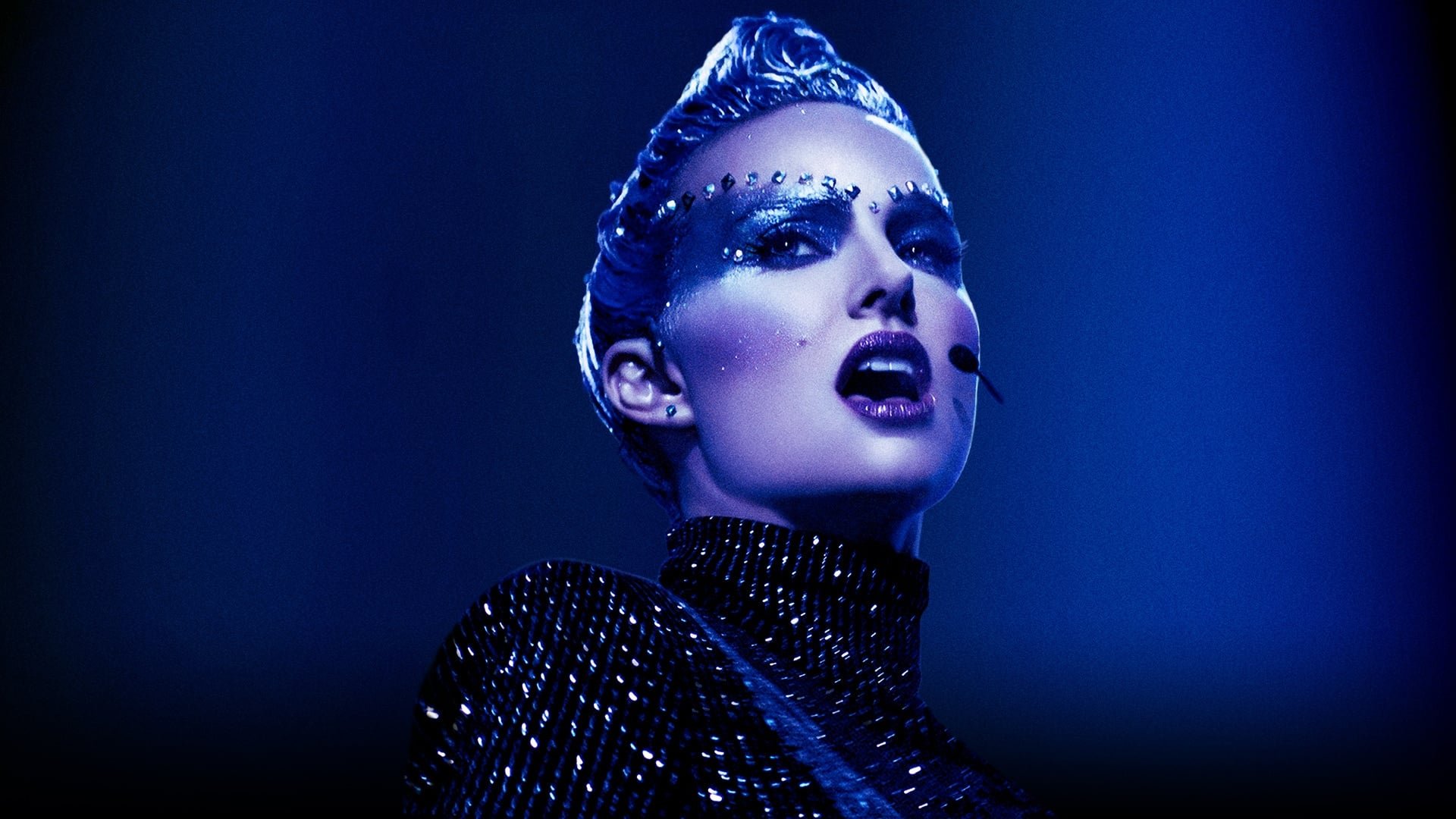 Cinematic background from Vox Lux 2018 - In 1999, teenage sisters Celeste and Eleanor survive a seismic, violent tragedy. The sisters compose and perform a song about their experience, making something lovely and cathartic out of a catastrophe - while also catapulting Celeste to stardom. By 2017, Celeste is a mother to a teenage daughter of her own and is struggling to navigate a career fraught with scandals when another act of terrifying violence demands her attention.