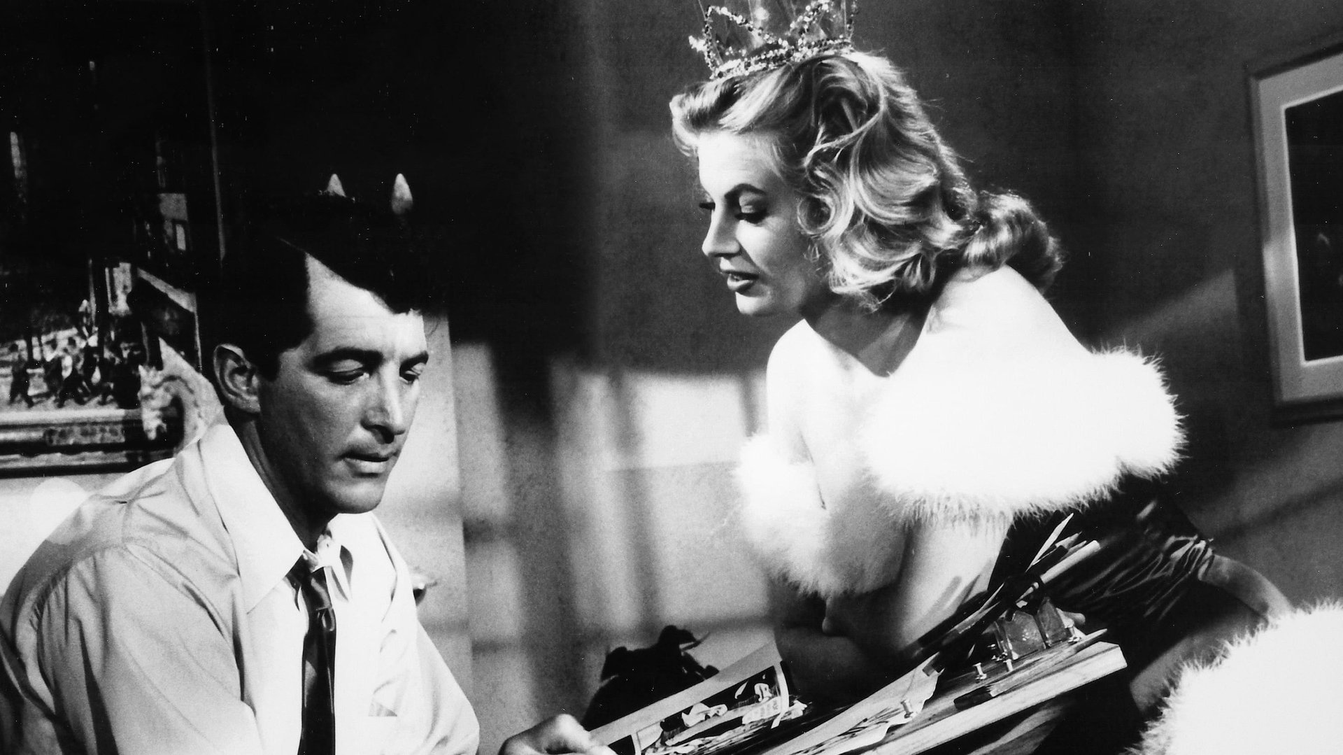 Cinematic background from Artists and Models 1955 - A struggling painter begins taking inspiration from the dreams of his friend and roommate, a comic book fan who narrates an adventure story while he sleeps, but unbeknownst to the latter, the artist of his favorite comic book lives in the same building as they do with the model for her drawings.