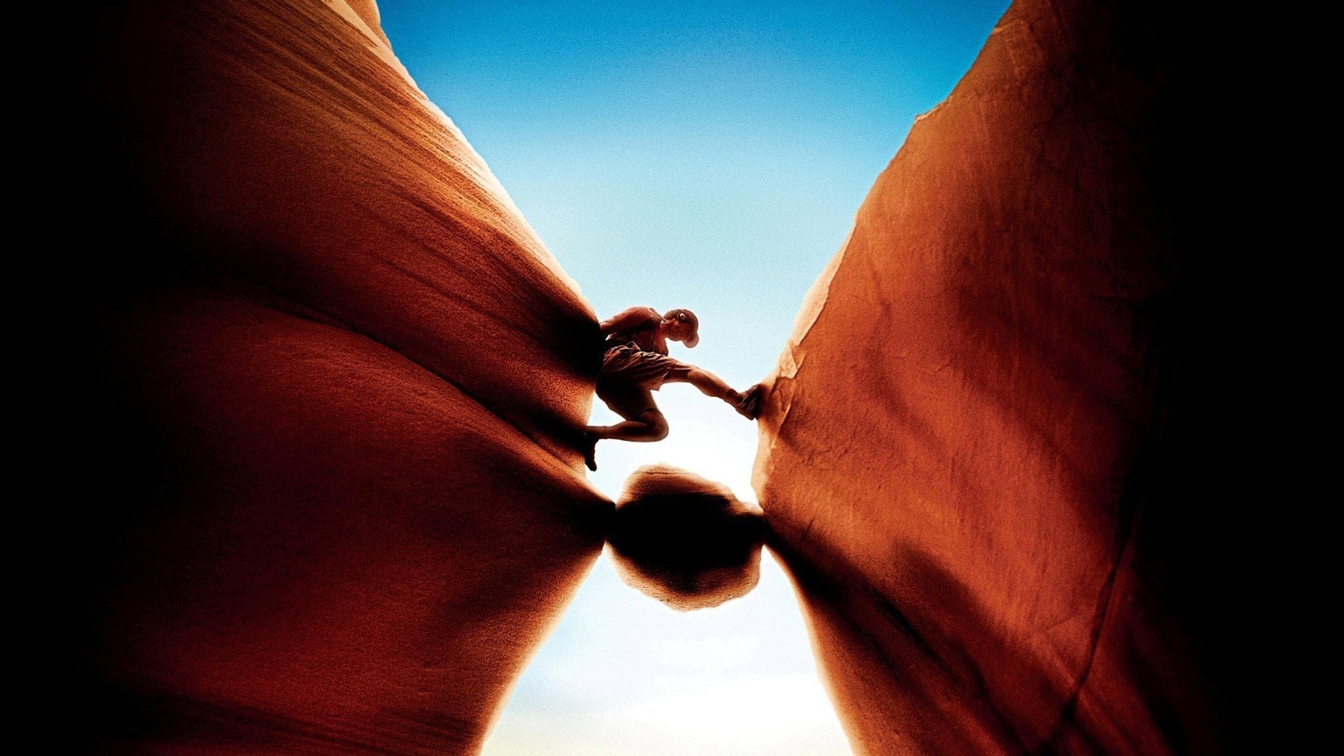 Cinematic background from 127 Hours 2010 - The true story of mountain climber Aron Ralston's remarkable adventure to save himself after a fallen boulder crashes on his arm and traps him in an isolated canyon in Utah.