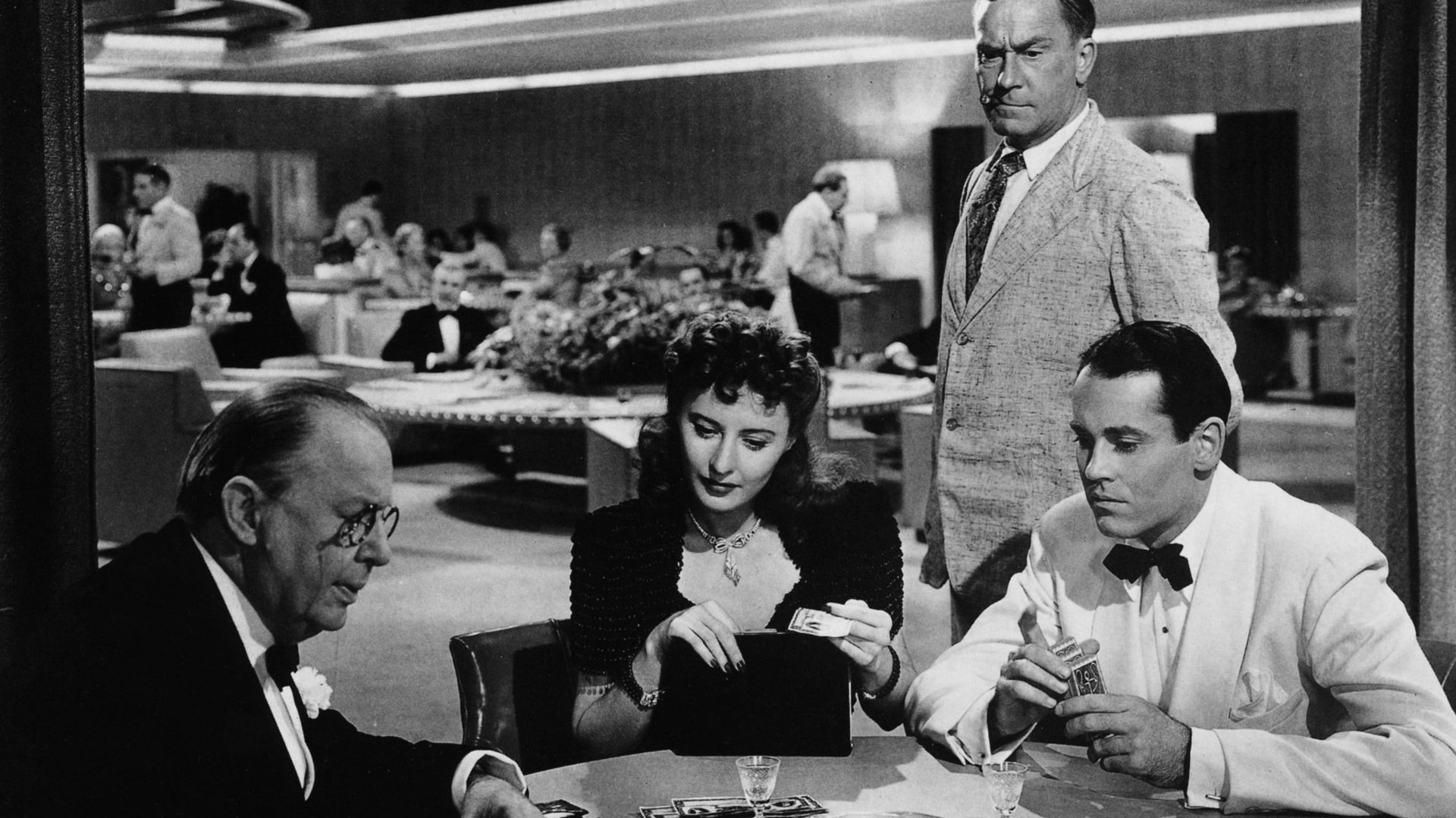 Cinematic background from The Lady Eve 1941 - It's no accident when wealthy Charles falls for Jean. Jean is a con artist with her sights set on Charles' fortune. Matters complicate when Jean starts falling for her mark. When Charles suspects Jean is a gold digger, he dumps her. Jean, fixated on revenge and still pining for the millionaire, devises a plan to get back in Charles' life. With love and payback on her mind, she re-introduces herself to Charles, this time as an aristocrat named Lady Eve Sidwich.