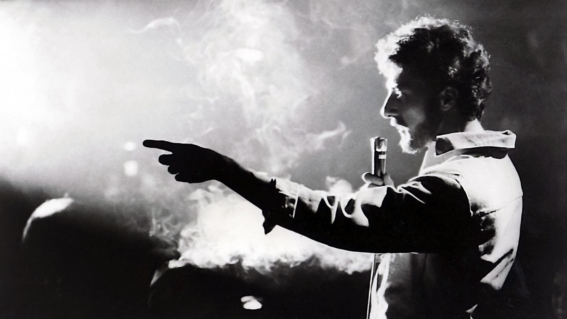 Cinematic background from Lenny 1974 - The story of acerbic 1960s comic Lenny Bruce, whose groundbreaking, no-holds-barred style and social commentary was often deemed by the establishment as too obscene for the public.