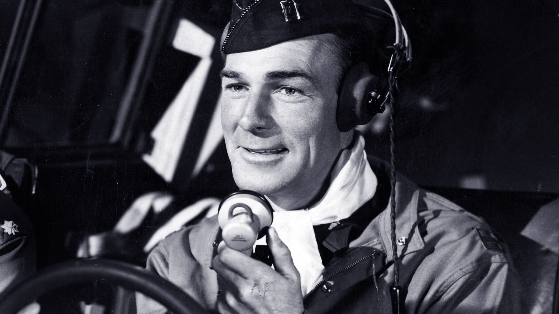 Cinematic background from Bombardier 1943 - A documentary/drama about the training of bombardiers during WWII. Major Chick Davis proves to the U.S. Army the superiority of high altitude precision bombing, and establishes a school for bombardiers. Training is followed in semi-documentary style, with personal dramas in subplots. The climax is a spectacular, if somewhat jingoistic, battle sequence.