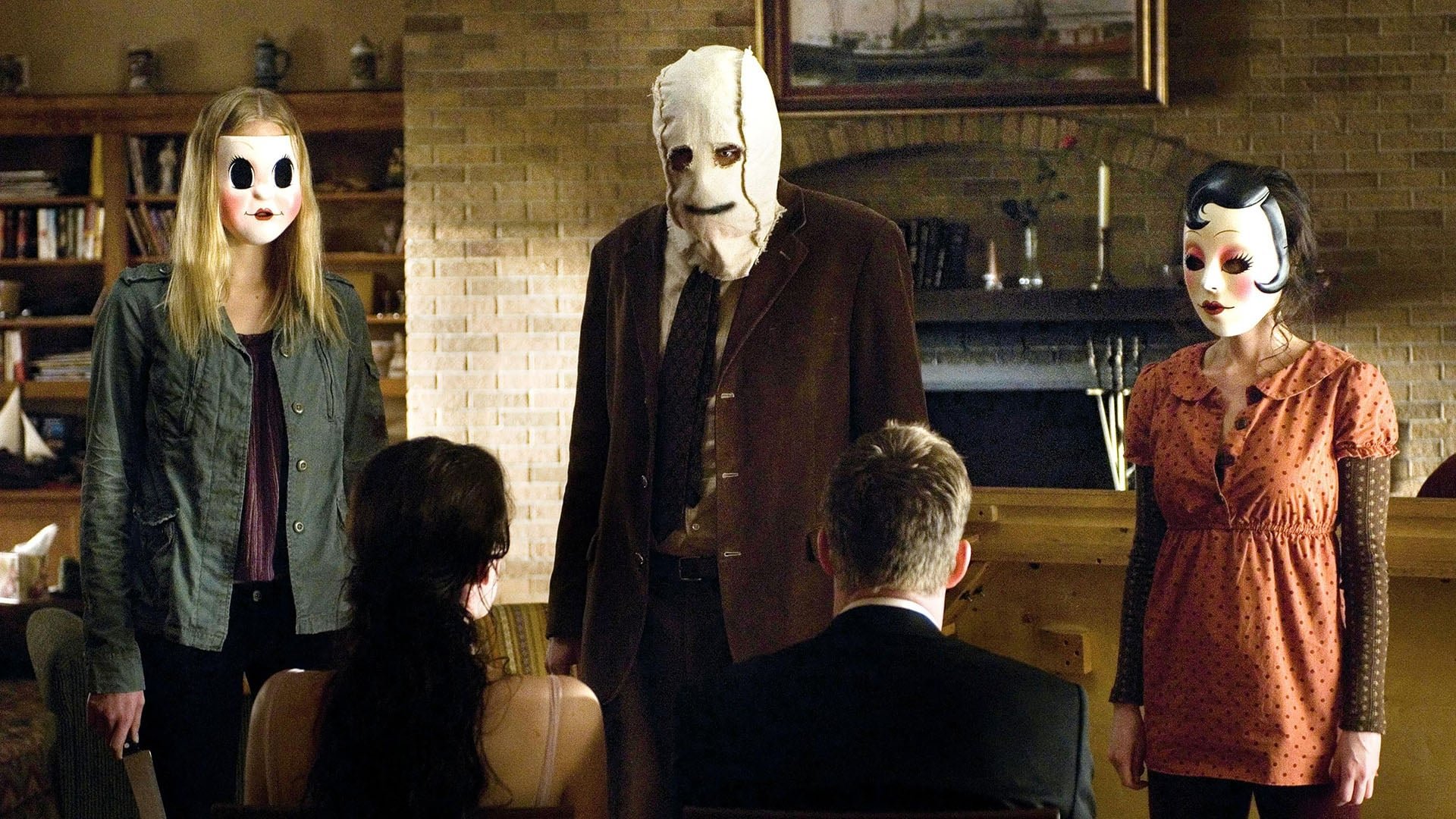 Cinematic background from The Strangers 2008 - After a 4 a.m. knock at the door and haunting voices, Kristen McKay and James Hoyt’s remote getaway becomes a psychological night of terror as three masked strangers invade. Now they must go far beyond what they thought themselves capable of if they hope to survive.