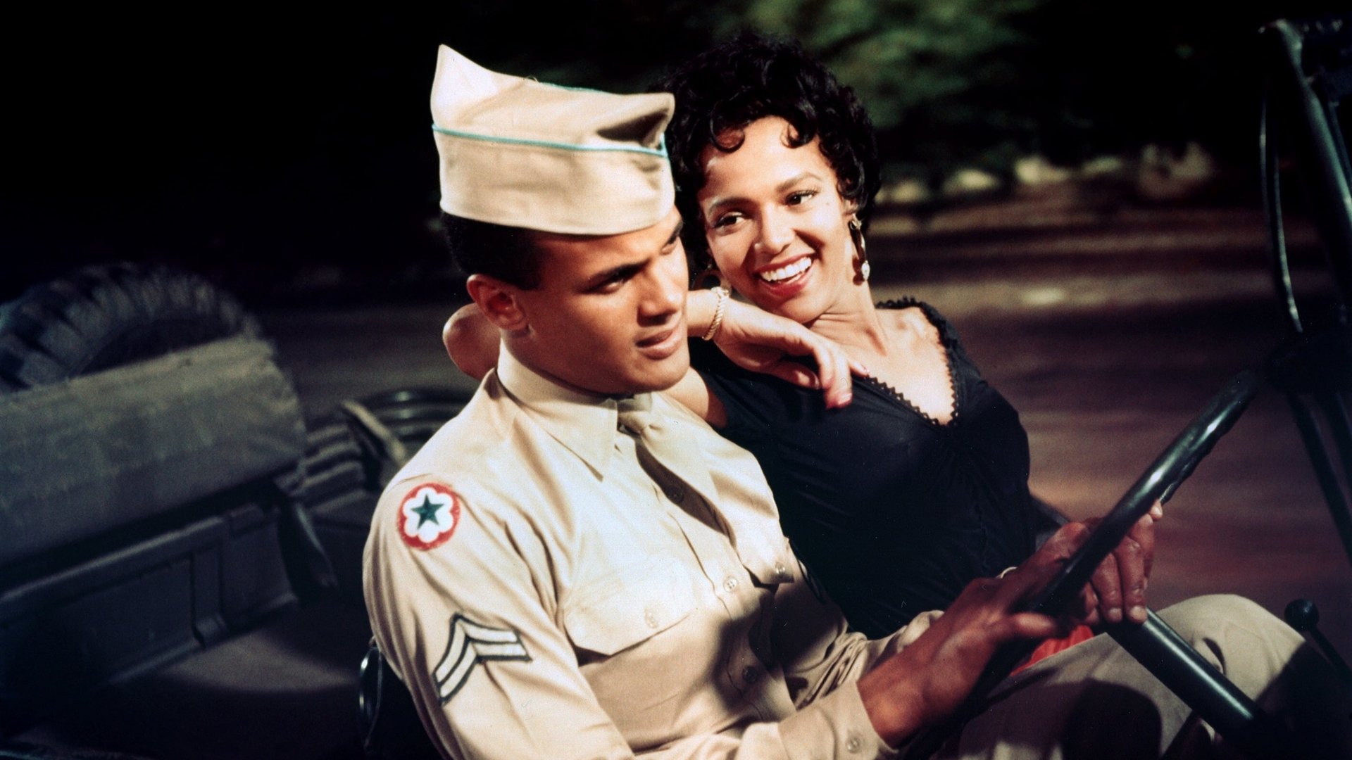 Cinematic background from Carmen Jones 1954 - The tale of the cigarette-maker Carmen and the Spanish cavalry soldier Don Jose is translated into a modern-day story of a parachute factory worker and a stalwart GI named Joe who is about to go to flying school. Conflict arises when a prize-ring champ captures the heart of Carmen after she has seduced Joe and caused him to go AWOL.