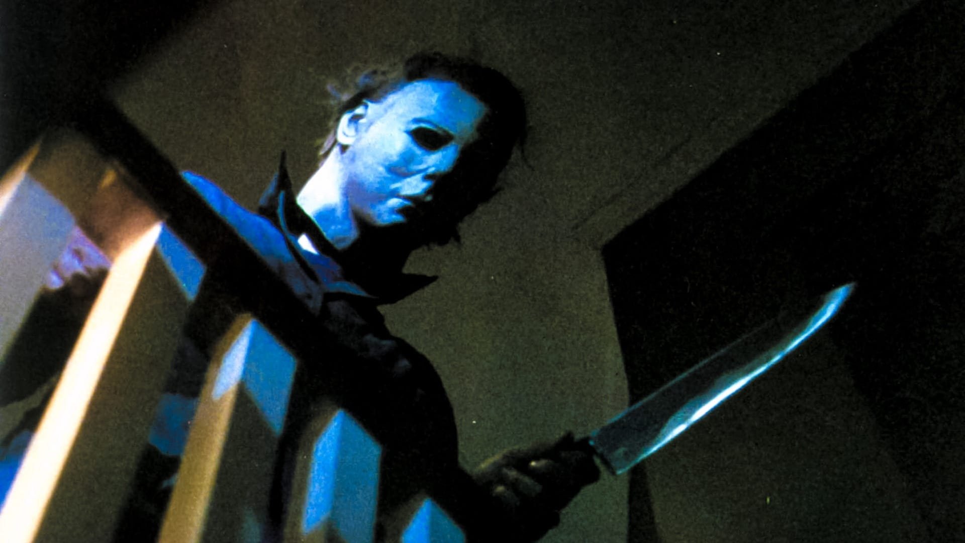 Cinematic background from Halloween 1978 - Fifteen years after murdering his sister on Halloween Night 1963, Michael Myers escapes from a mental hospital and returns to the small town of Haddonfield, Illinois to kill again.