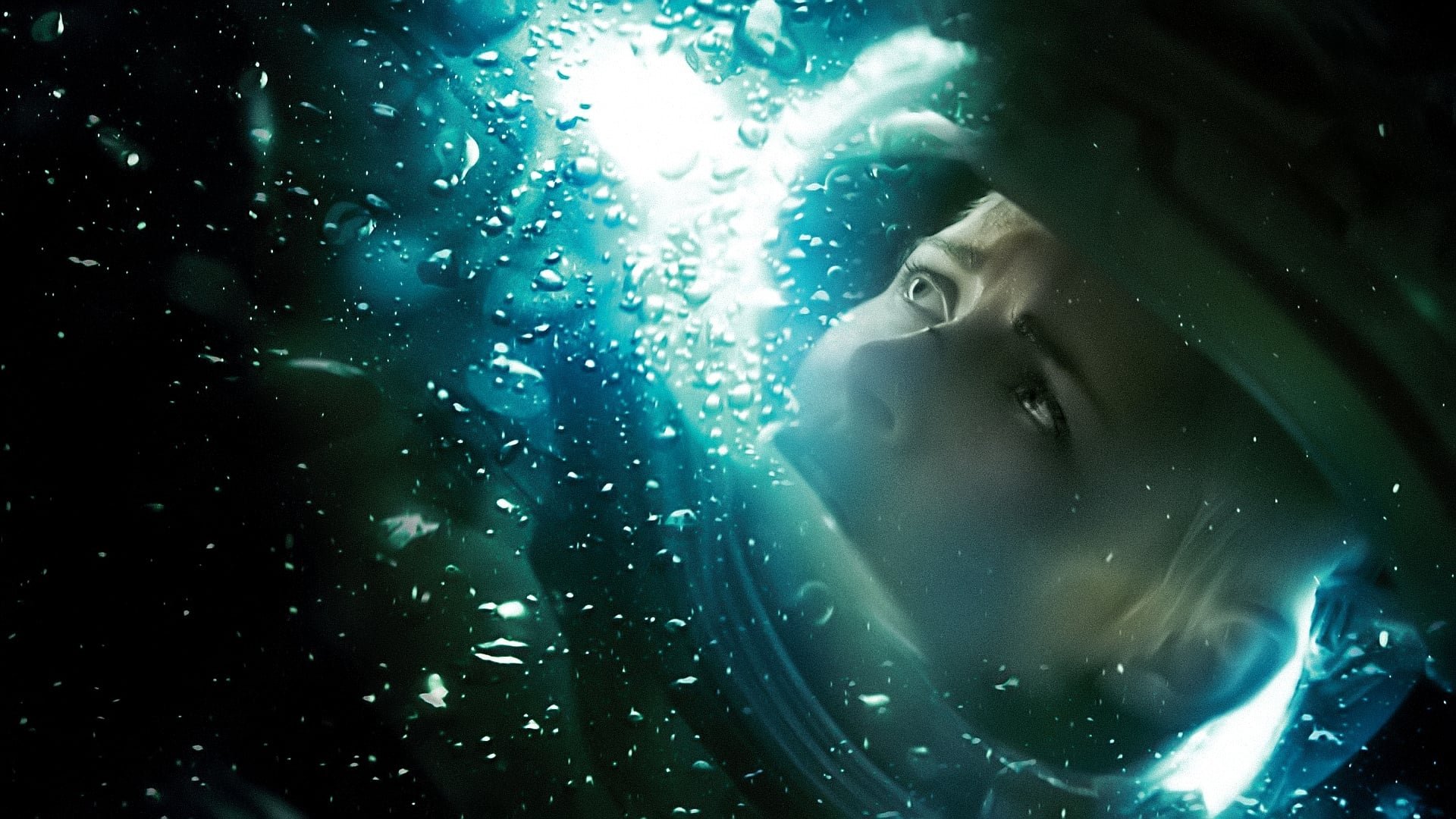 Cinematic background from Underwater 2020 - After an earthquake destroys their underwater station, six researchers must navigate two miles along the dangerous, unknown depths of the ocean floor to make it to safety in a race against time.