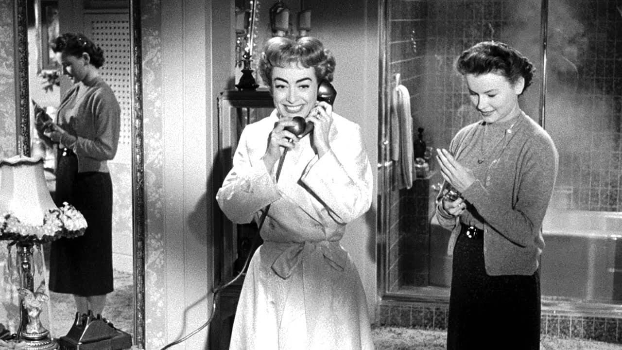 Cinematic background from Queen Bee 1955 - A devilish Southern woman, married to a man who despises her, manages to manipulate those around her under the guise of being kind. But, when her sister-in-law is engaged to be married to the woman's former lover and her husband starts up an affair with her cousin, visting from New York, things start to go awry and she sets a plan to destroy it all.