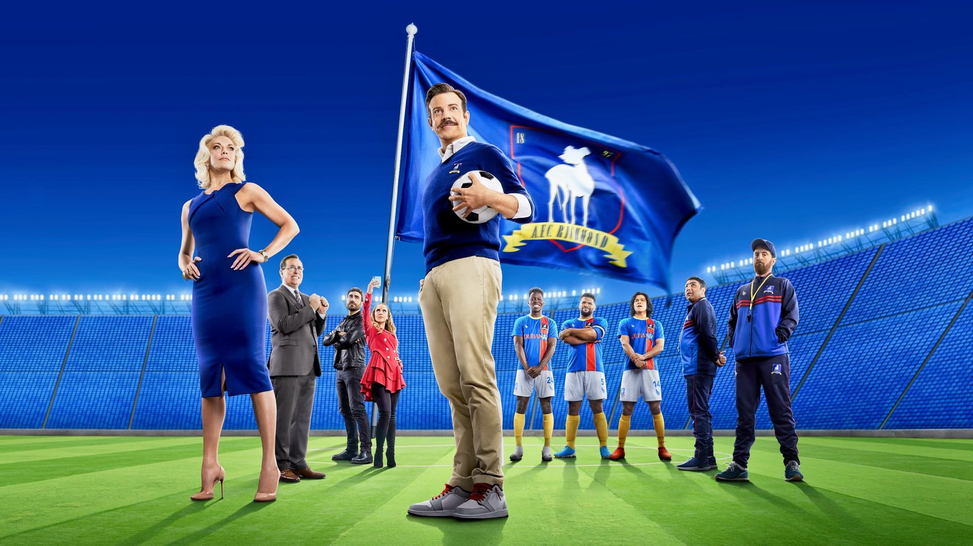 Cinematic background from Ted Lasso 2020 - 2023 - Ted Lasso, an American football coach, moves to England when he’s hired to manage a soccer team—despite having no experience. With cynical players and a doubtful town, will he get them to see the Ted Lasso Way?