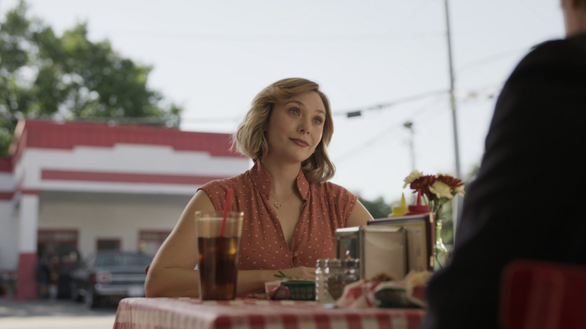 Cinematic background from Love & Death 2023 - 2023 - Candy and Pat Montgomery and Betty and Allan Gore — two churchgoing couples — enjoy their small town Texas life… until an extramarital affair leads somebody to pick up an axe.