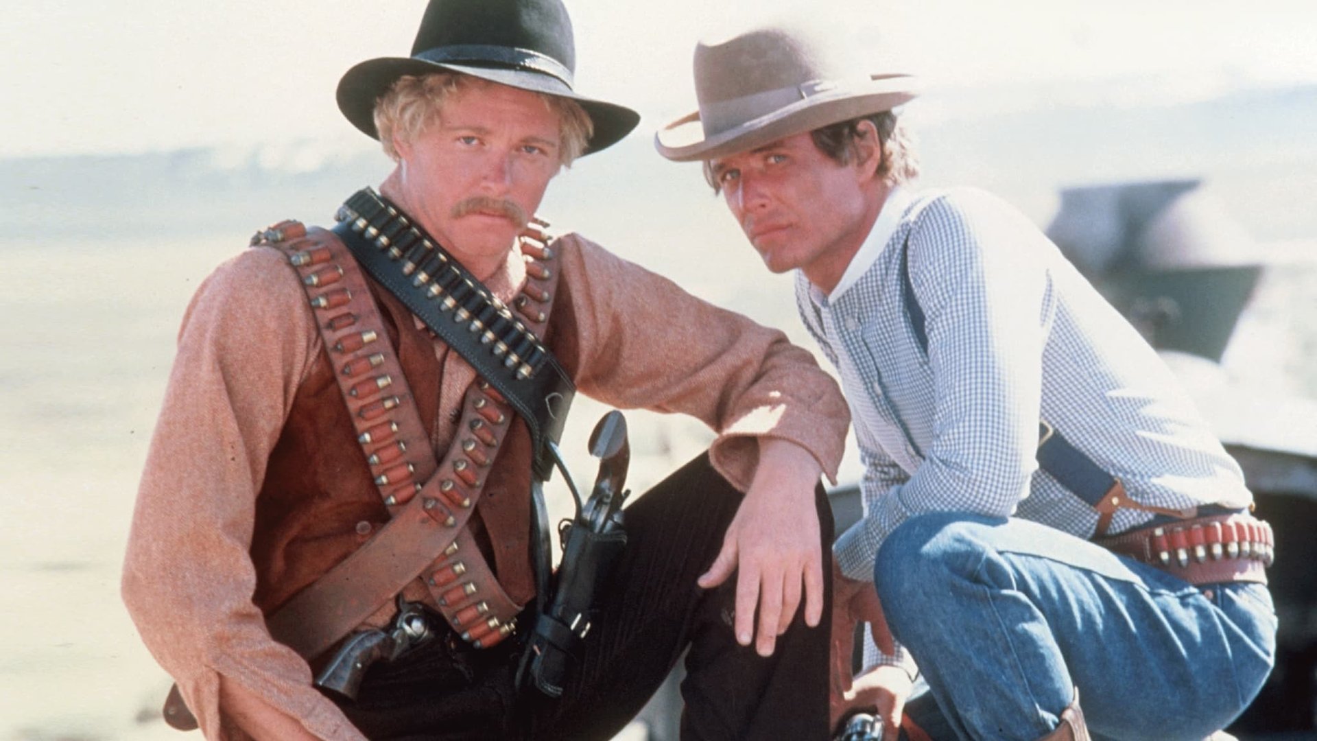 Cinematic background from Butch and Sundance: The Early Days 1979 - Before the adventures that made them legends, they were charming mastermind Robert Leroy Parker, alias Butch Cassidy, and crack-shot outlaw Harry Alonzo Longabaugh, soon to be known as The Sundance Kid. This is the 'prequel' of how they met, their first clumsy robberies, the heroic dangers that abound them together, the secret that nearly tore them apart, and the impossible train heist that made them notorious for life. Saddle up and ride with the showdowns, shootouts, bad guys and good times in the days before the fame when fun was the name of the game.