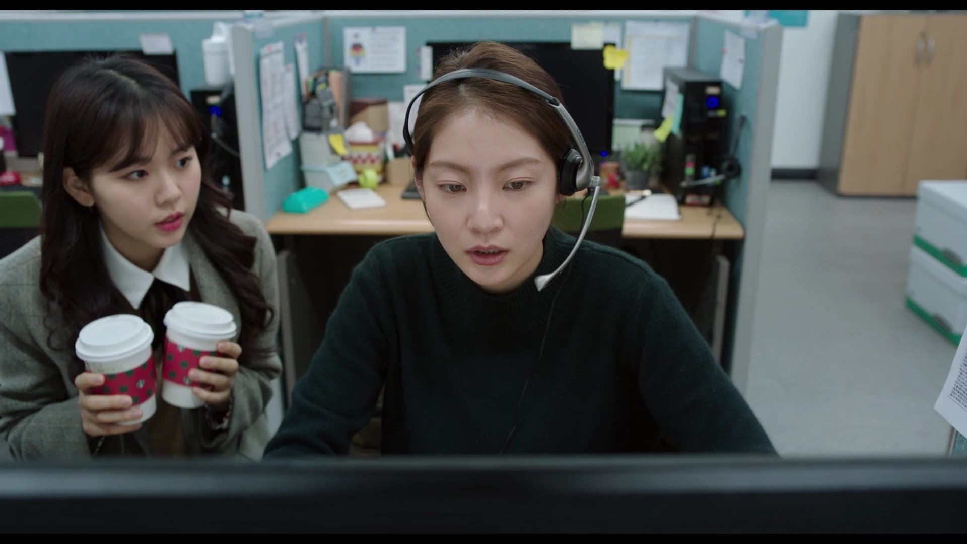 Cinematic background from Aloners 2021 - Jina is the top employee at a credit card company call center. She avoids building close relationships, choosing instead to live and work alone – until she is suddenly tasked with training a new recruit.
