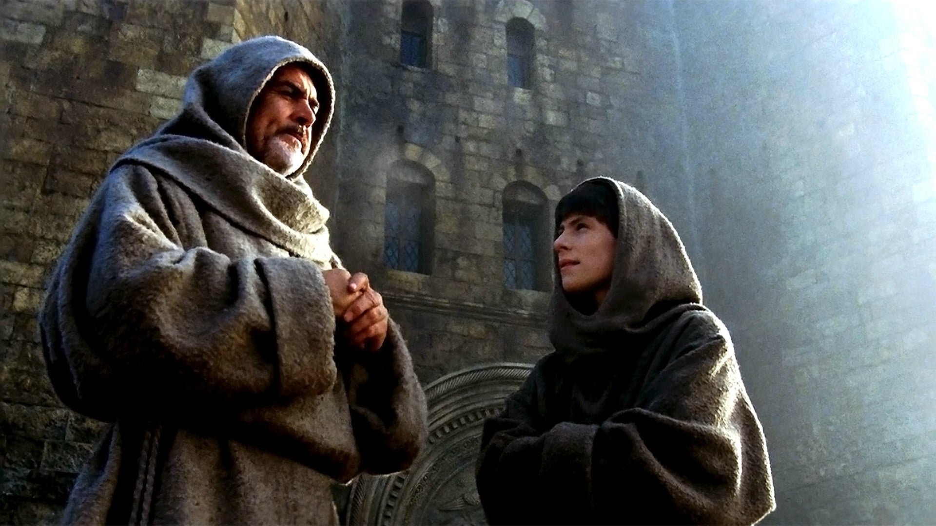 Cinematic background from The Name of the Rose 1986 - 14th-century Franciscan monk William of Baskerville and his young novice arrive at a conference to find that several monks have been murdered under mysterious circumstances. To solve the crimes, William must rise up against the Church's authority and fight the shadowy conspiracy of monastery monks using only his intelligence – which is considerable.