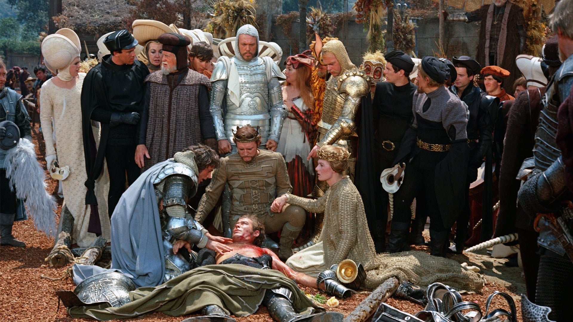 Cinematic background from Camelot 1967 - The plot of his illegitimate son Mordred to gain the throne, and Guinevere's growing attachment to Sir Lancelot, threatens to topple King Arthur and destroy his "round table" of knights.