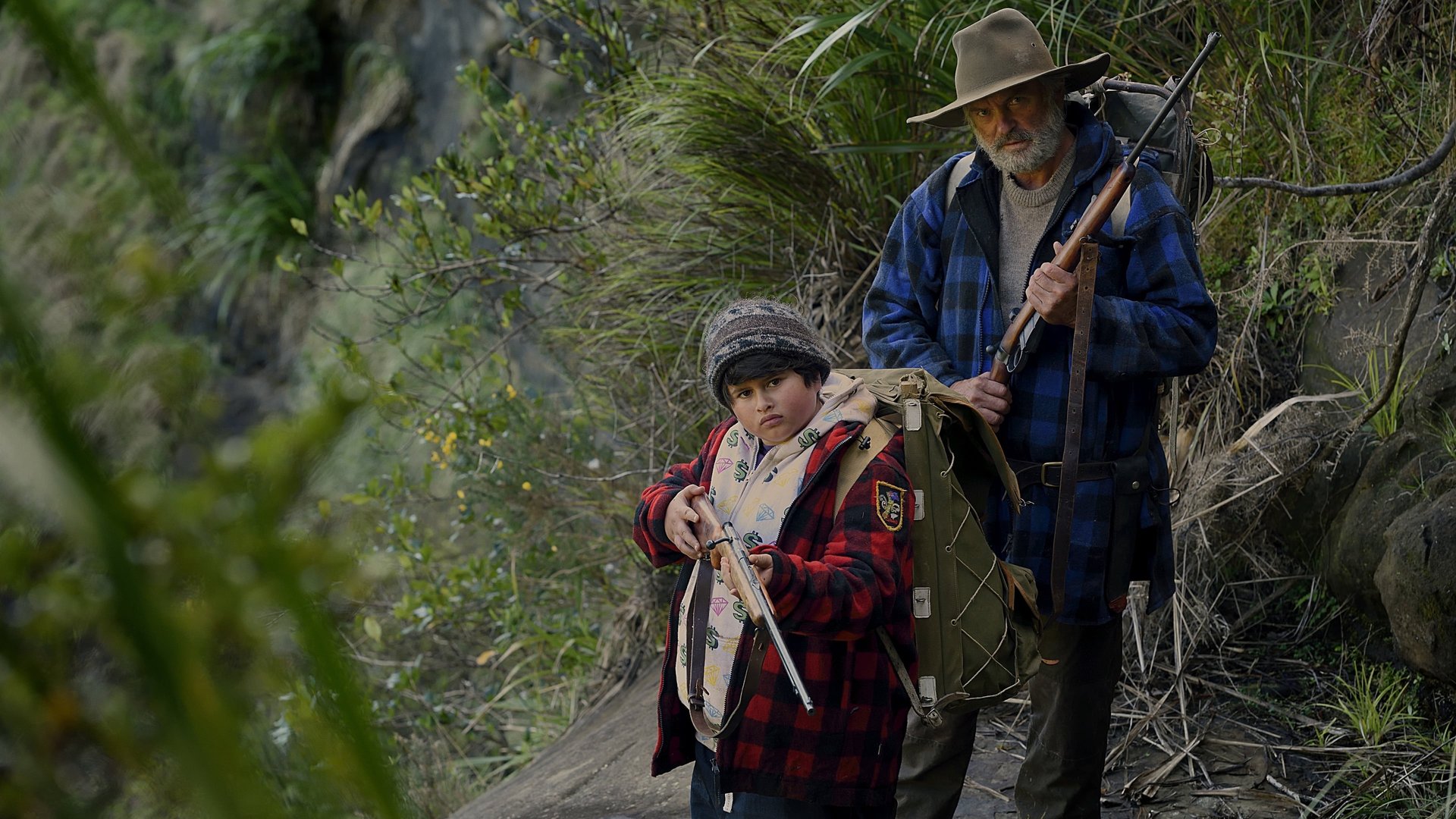 Cinematic background from Hunt for the Wilderpeople 2016 - Ricky is a defiant young city kid who finds himself on the run with his cantankerous foster uncle in the wild New Zealand bush. A national manhunt ensues, and the two are forced to put aside their differences and work together to survive.