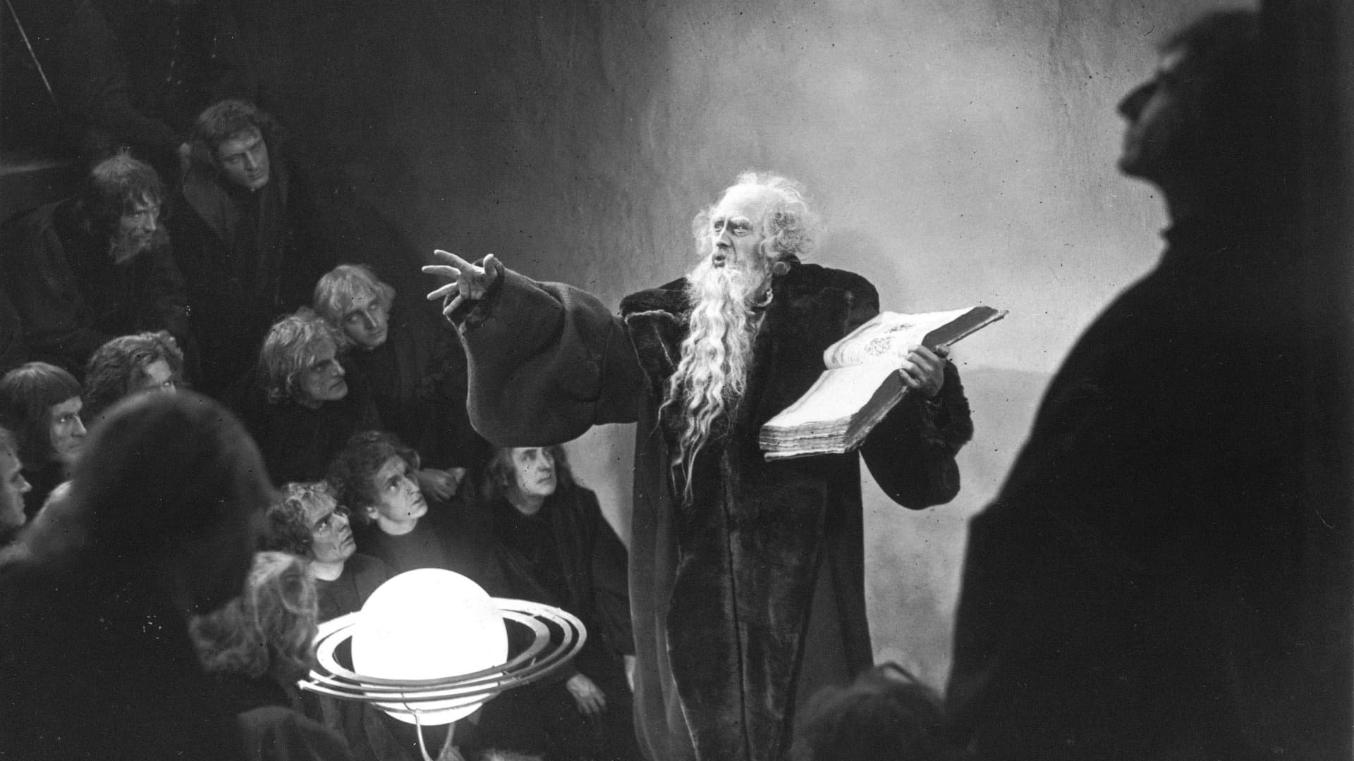 Cinematic background from Faust 1926 - God and Satan war over earth; to settle things, they wager on the soul of Faust, a learned and prayerful alchemist.