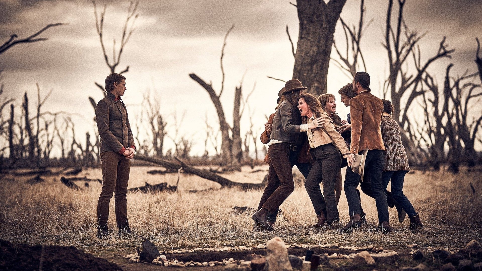 Cinematic background from True History of the Kelly Gang 2019 - Set against the badlands of Australia where the English rule with a bloody fist and the Irish endure, Ned Kelly discovers he comes from a line of Irish rebels — an uncompromising army of cross dressing bandits immortalised for terrorising their oppressors back in Ireland. Fuelled by the unfair arrest of his mother, Kelly recruits a wild bunch of warriors to plot one of the most audacious attacks of anarchy and rebellion the country has ever seen.