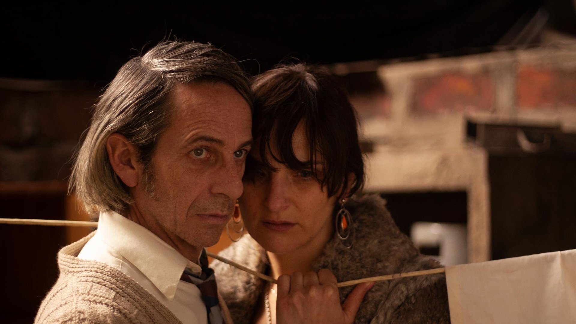 Cinematic background from Post Mortem 2010 - In Chile, 1973, during the last days of Salvador Allende's presidency, an employee at a Morgue's recording office falls for a burlesque dancer who mysteriously disappears.