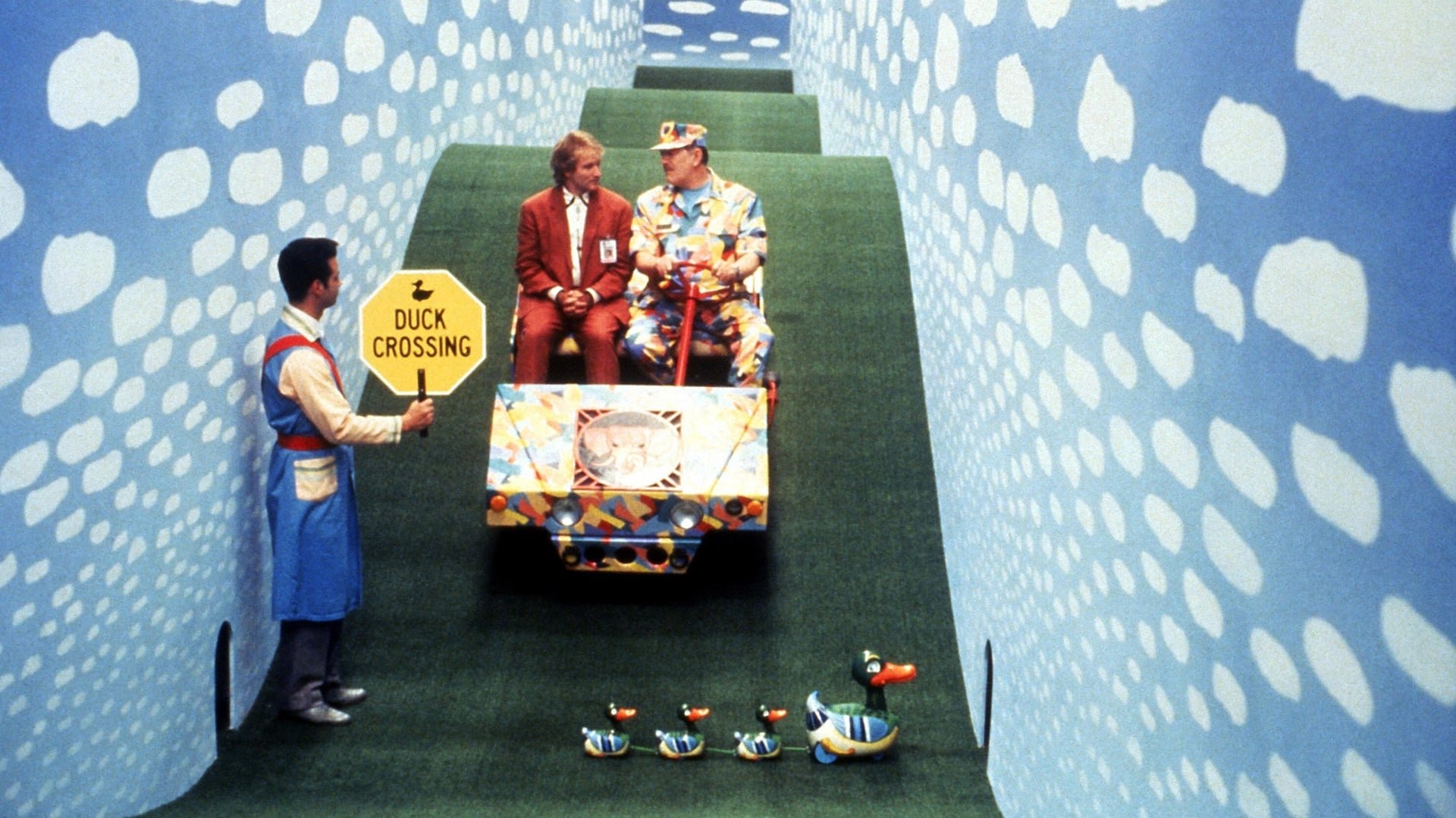 Cinematic background from Toys 1992 - Leslie Zevo is a fun-loving inventor who must save his late father's toy factory from his evil uncle, Leland, a war-mongering general who rules the operation with an iron fist and builds weapons disguised as toys.