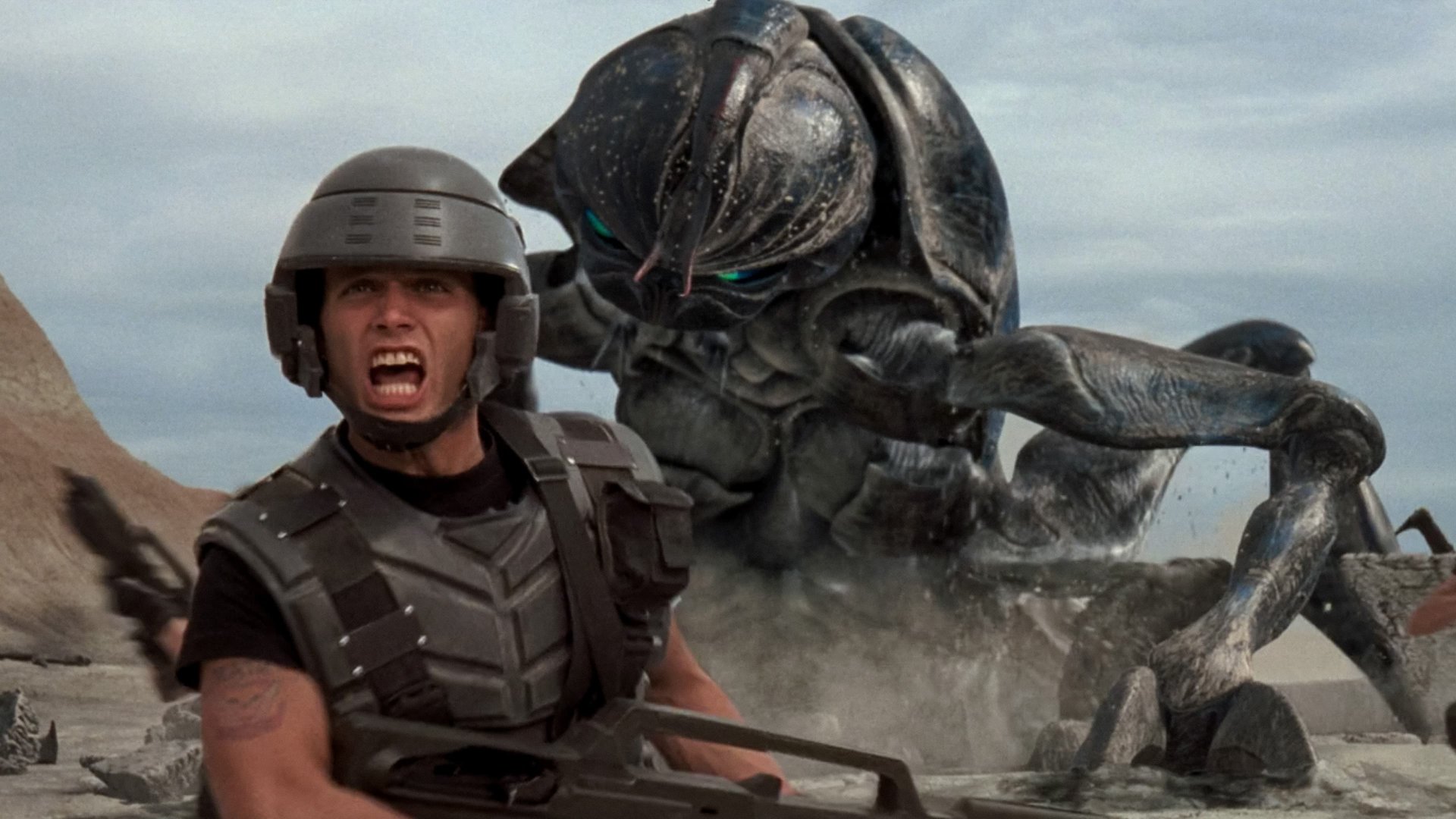 Cinematic background from Starship Troopers 1997 - Set in the future, the story follows a young soldier named Johnny Rico and his exploits in the Mobile Infantry. Rico's military career progresses from recruit to non-commissioned officer and finally to officer against the backdrop of an interstellar war between mankind and an arachnoid species known as "the Bugs".