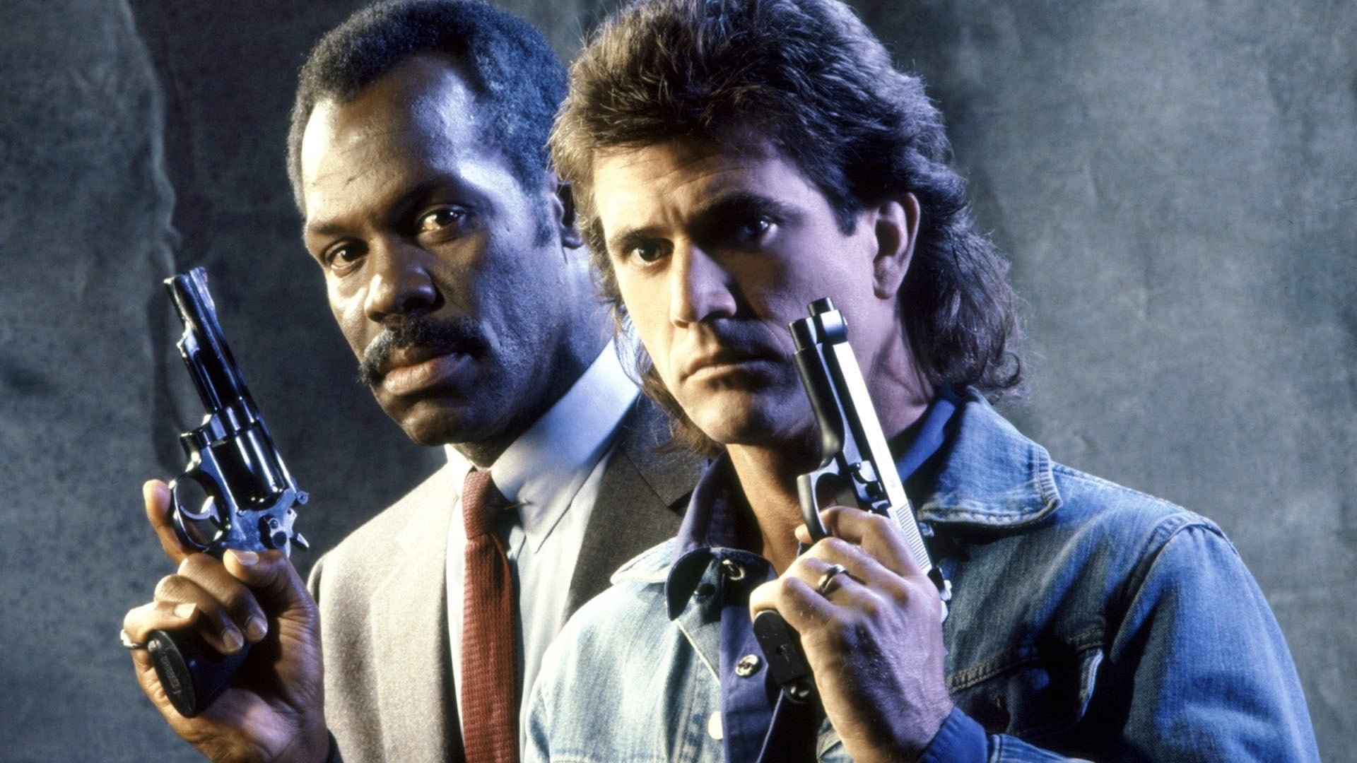 Cinematic background from Lethal Weapon 1987 - Veteran buttoned-down LAPD detective Roger Murtaugh is partnered with unhinged cop Martin Riggs, who -- distraught after his wife's death -- has a death wish and takes unnecessary risks with criminals at every turn. The odd couple embark on their first homicide investigation as partners, involving a young woman known to Murtaugh with ties to a drug and prostitution ring.