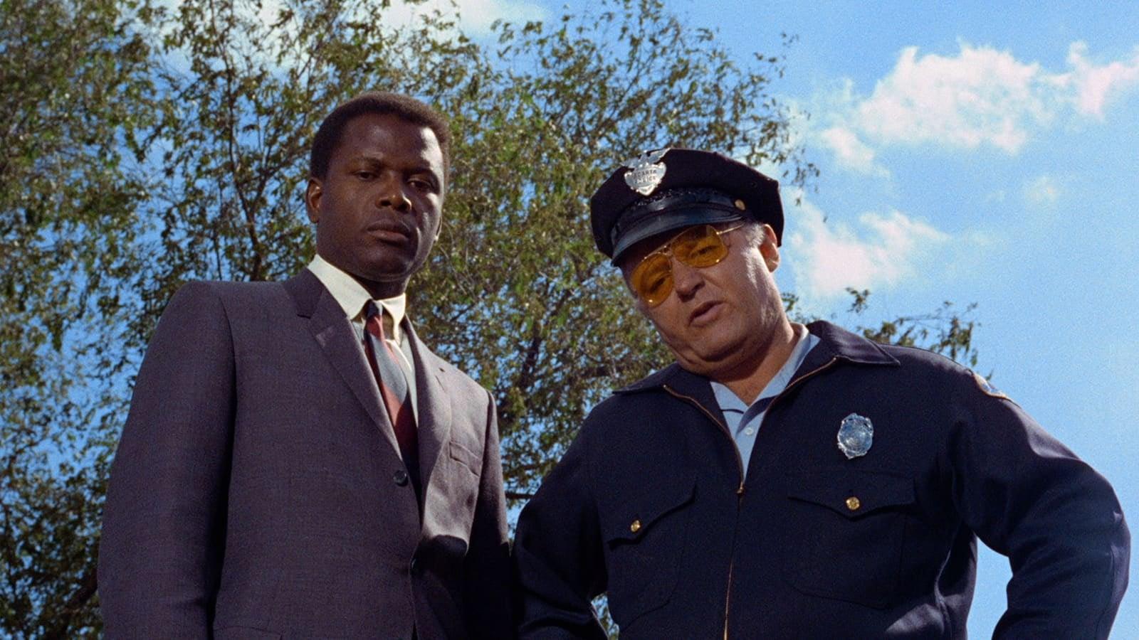 Cinematic background from In the Heat of the Night 1967 - African-American Philadelphia police detective Virgil Tibbs is arrested on suspicion of murder by Bill Gillespie, the racist police chief of tiny Sparta, Mississippi. After Tibbs proves not only his own innocence but that of another man, he joins forces with Gillespie to track down the real killer. Their investigation takes them through every social level of the town, with Tibbs making enemies as well as unlikely friends as he hunts for the truth.