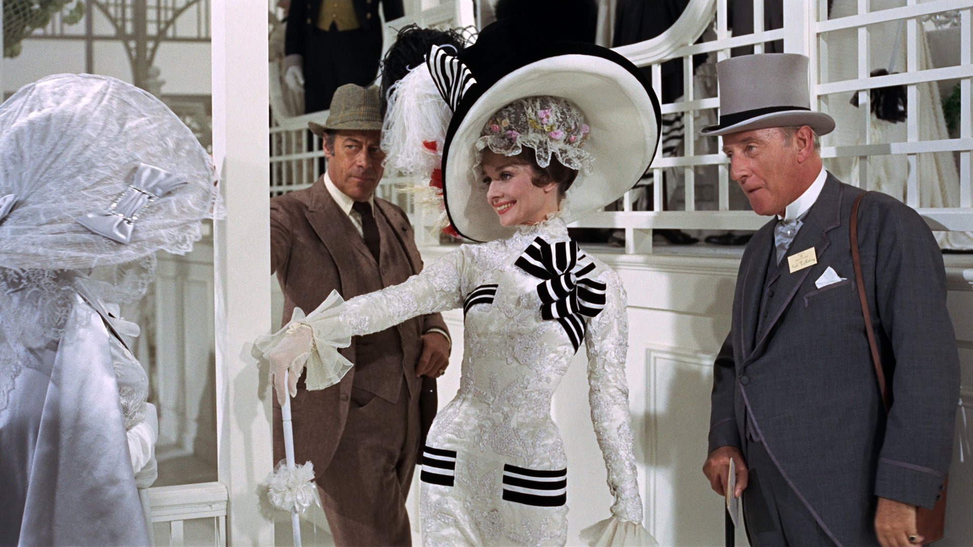 Cinematic background from My Fair Lady 1964 - A snobbish phonetics professor agrees to a wager that he can take a flower girl and make her presentable in high society.