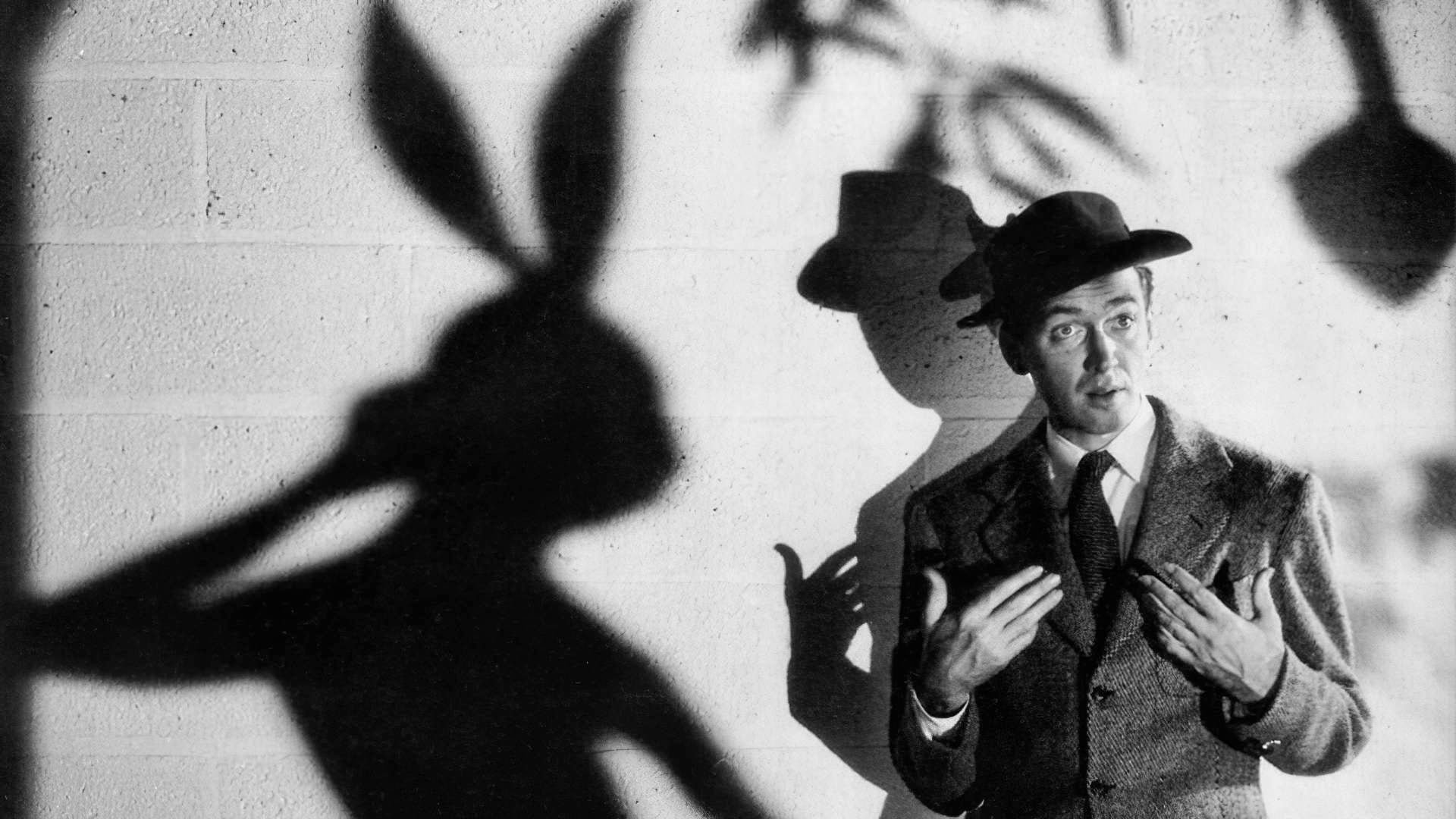 Cinematic background from Harvey 1950 - The story of Elwood P. Dowd who makes friends with a spirit taking the form of a human-sized rabbit named Harvey that only he sees (and a few privileged others on occasion also.) After his sister tries to commit him to a mental institution, a comedy of errors ensues. Elwood and Harvey become the catalysts for a family mending its wounds and for romance blossoming in unexpected places.