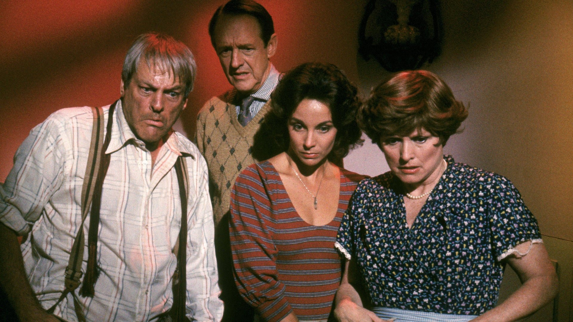 Cinematic background from Twilight Zone: The Movie 1983 - 1959. Friday nights. We time-traveled. Witnessed surprising twists. Entertained aliens. Experienced fear. And first journeyed to "The Twilight Zone" of Rod Serling's memorable TV series. And guided by four imaginative moviemakers, we traveled there again in 1983. Directors John Landis, Steven Spielberg, Joe Dante and George Miller fashion stories based on or inspired by classic episodes. Landis weaves the tale of a bigot who gets a walloping dose of his own hatred. Spielberg takes over with a fable of senior citizens offered a magical rejuvenation. Dante serves up a terror trip with a child who uses his cartoon-inspired powers to enslave his family. Then fright goes aloft with Miller's finale about a neurotic passenger who sees a monster on the jetliner's wing. Or does he?