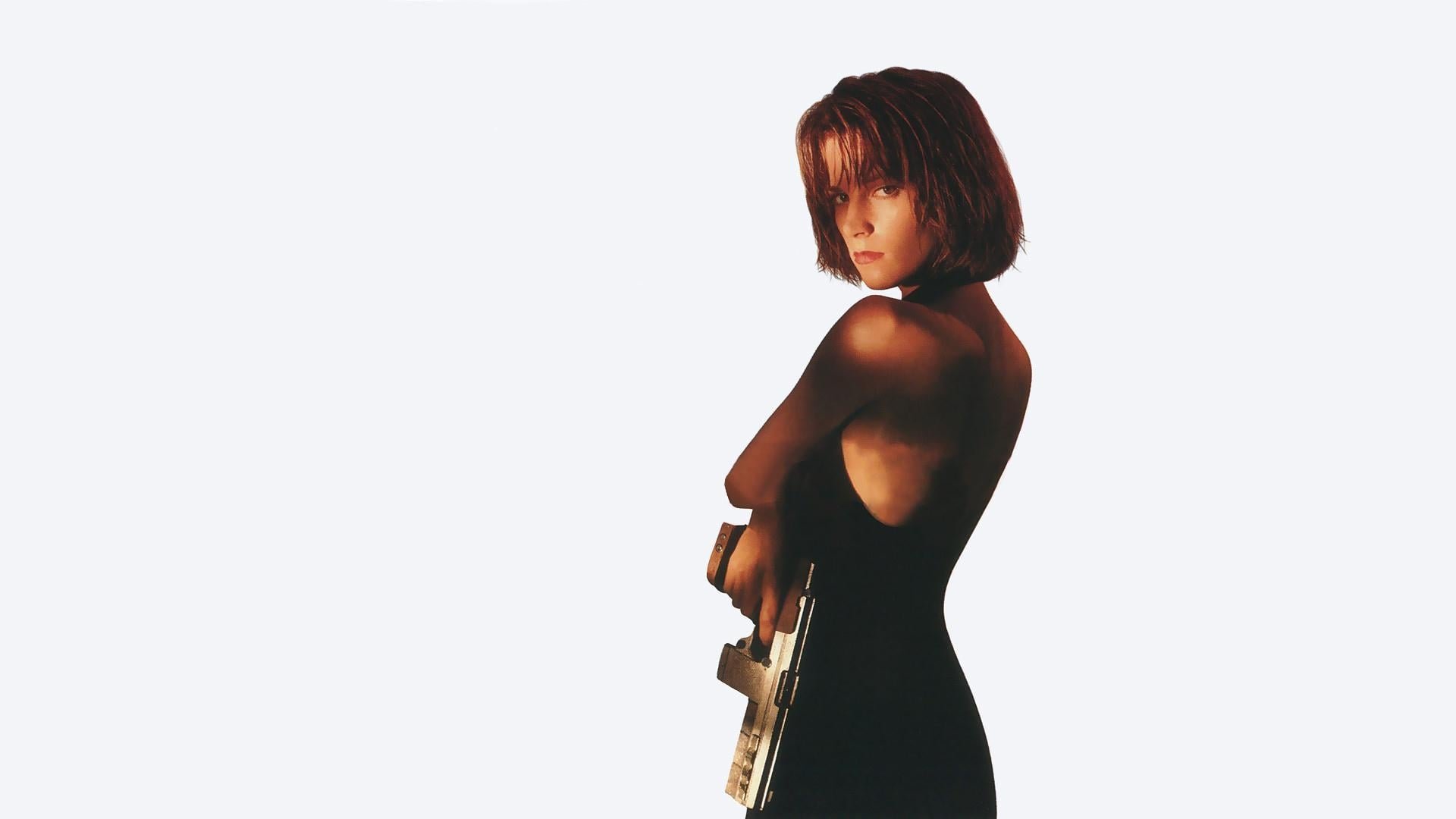 Cinematic background from Point of No Return 1993 - Hardened criminal Maggie Hayward's consistent violence, even in police custody, ends in the execution chamber. However, top-secret US government agent 'Bob' arranges a staged death, so Maggie can be elaborately trained as a phantom killer and subdued into obedience.