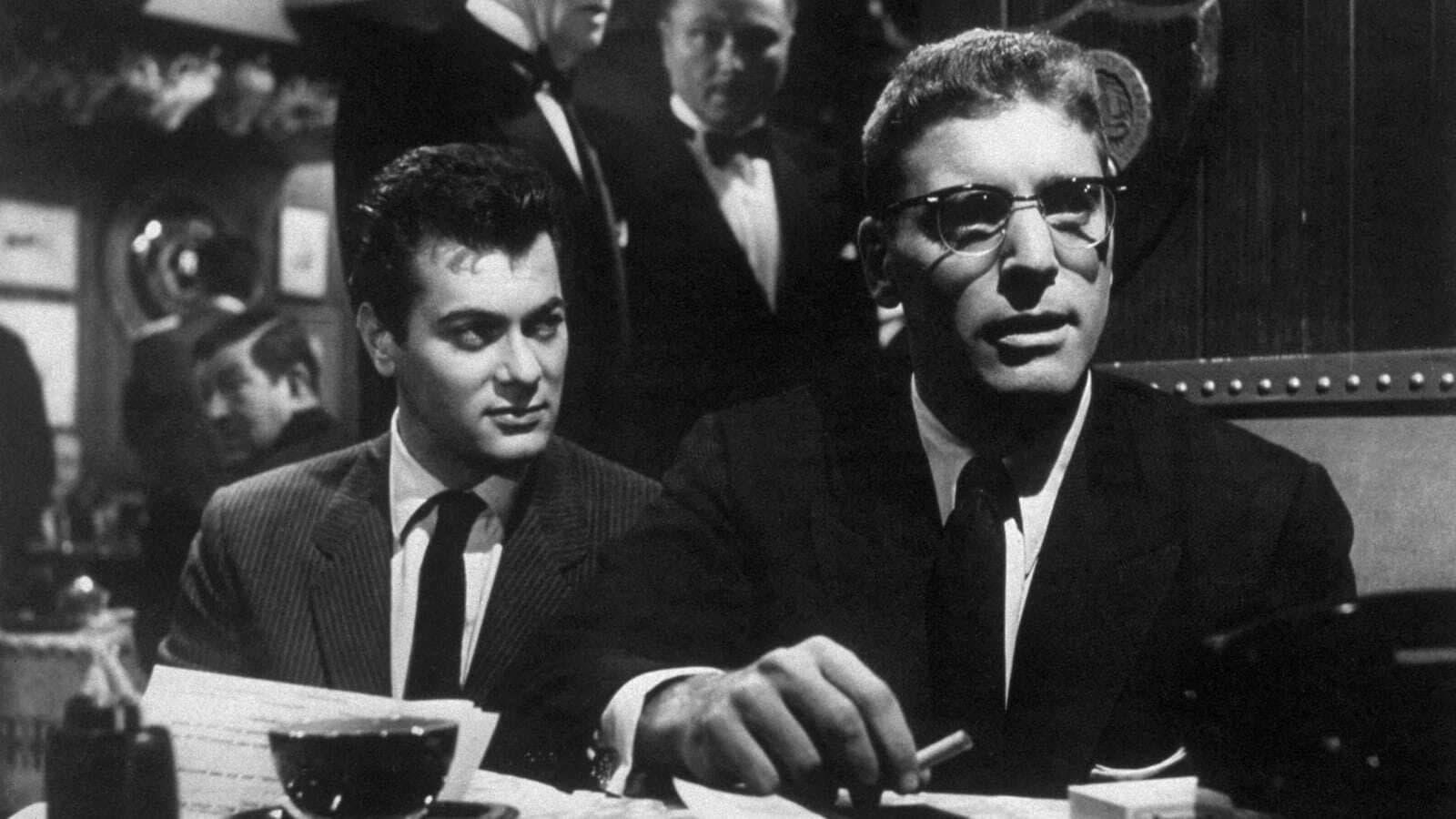 Cinematic background from Sweet Smell of Success 1957 - New York City newspaper writer J.J. Hunsecker holds considerable sway over public opinion with his Broadway column, but one thing that he can't control is his younger sister, Susan, who is in a relationship with aspiring jazz guitarist Steve Dallas. Hunsecker strongly disapproves of the romance and recruits publicist Sidney Falco to find a way to split the couple, no matter how ruthless the method.