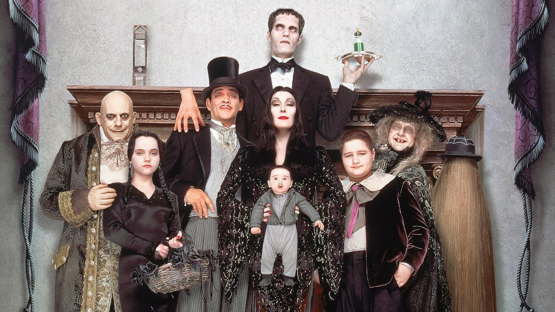 Cinematic background from Addams Family Values 1993 - Siblings Wednesday and Pugsley Addams will stop at nothing to get rid of Pubert, the new baby boy adored by parents Gomez and Morticia. Things go from bad to worse when the new "black widow" nanny, Debbie Jellinsky, launches her plan to add Fester to her collection of dead husbands.