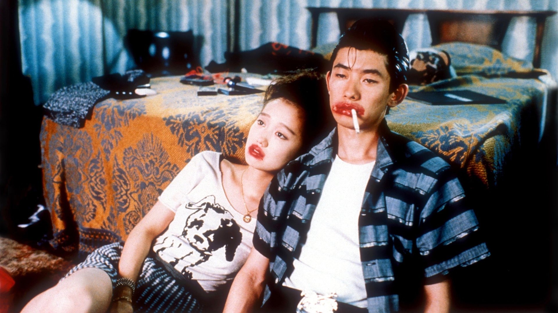 Cinematic background from Mystery Train 1989 - In Memphis, Tennessee, over the course of a single night, the Arcade Hotel, run by an eccentric night clerk and a clueless bellboy, is visited by a young Japanese couple traveling in search of the roots of rock; an Italian woman in mourning who stumbles upon a fleeing charlatan girl; and a comical trio of accidental thieves looking for a place to hide.