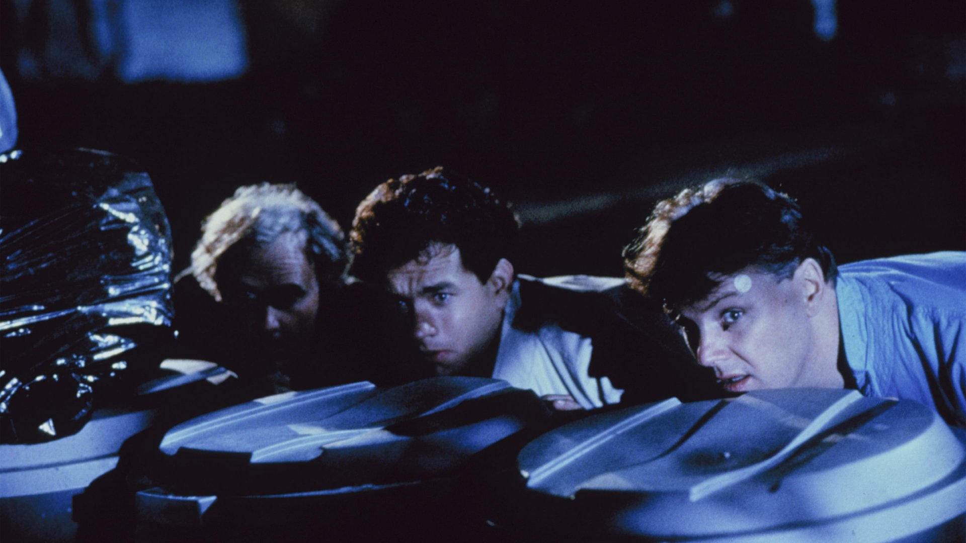 Cinematic background from The 'Burbs 1989 - When secretive new neighbors move in next door, suburbanite Ray Peterson and his friends let their paranoia get the best of them as they start to suspect the newcomers of evildoings and commence an investigation. But it's hardly how Ray, who much prefers drinking beer, reading his newspaper and watching a ball game on the tube expected to spend his vacation.