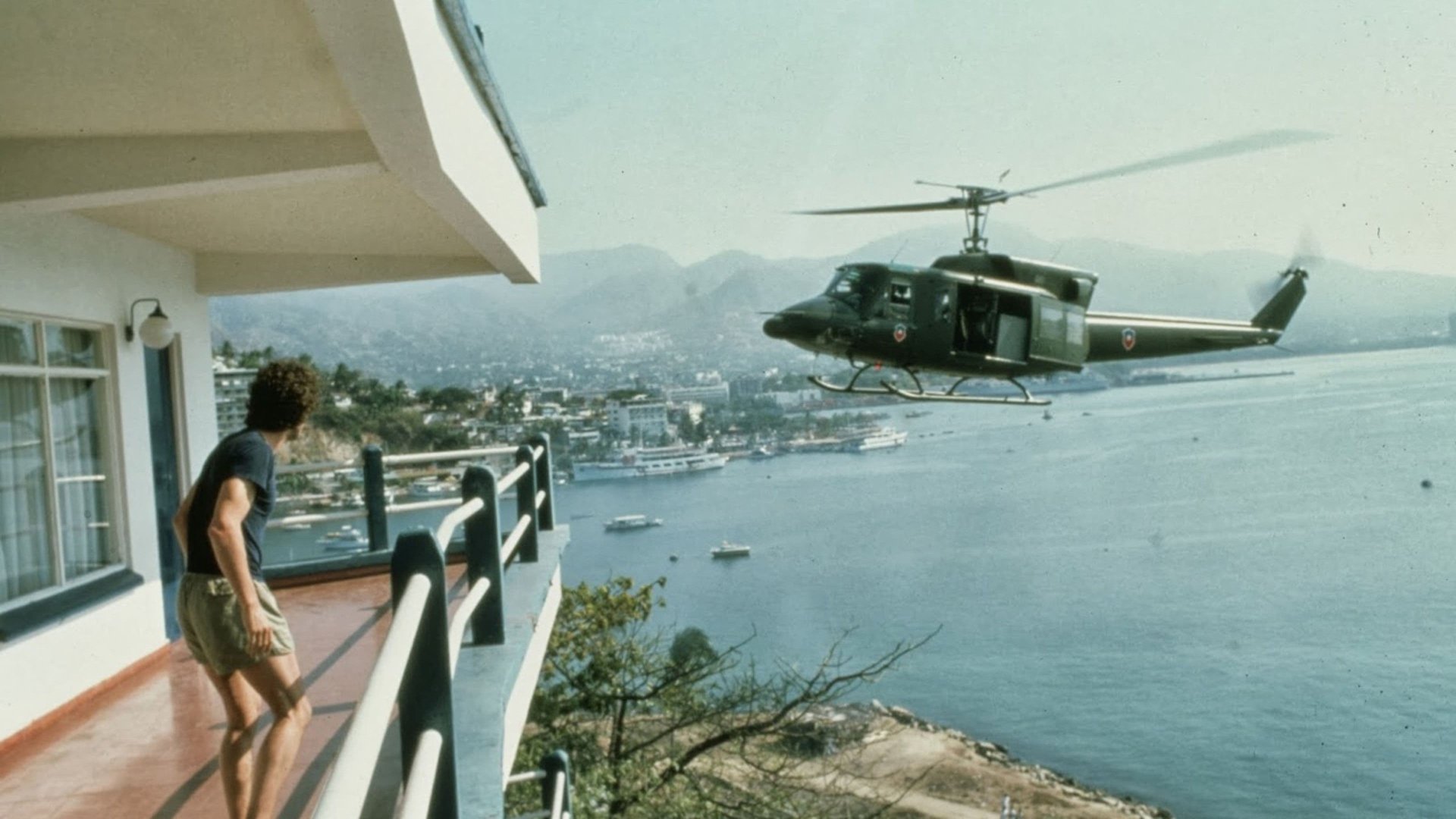 Cinematic background from Missing 1982 - Based on the real-life experiences of Ed Horman. A conservative American businessman travels to Chile to investigate the sudden disappearance of his son after a military takeover. Accompanied by his son's wife he uncovers a trail of cover-ups that implicate the US State department which supports the dictatorship.
