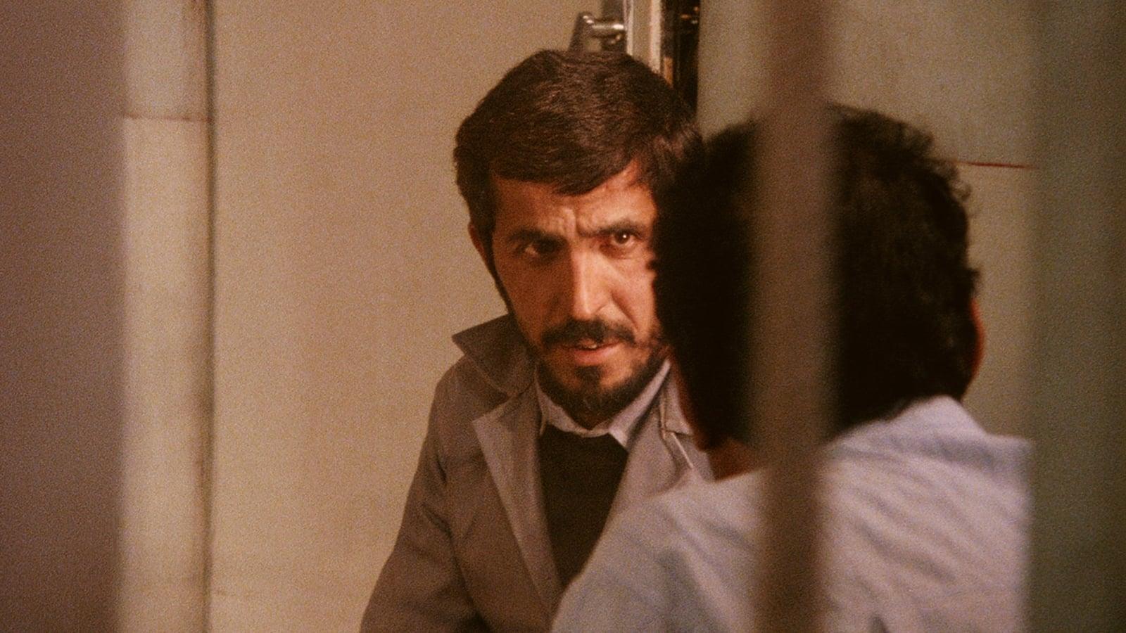 Cinematic background from Close-Up 1990 - This fiction-documentary hybrid uses a sensational real-life event—the arrest of a young man on charges that he fraudulently impersonated the well-known filmmaker Mohsen Makhmalbaf—as the basis for a stunning, multilayered investigation into movies, identity, artistic creation, and existence, in which the real people from the case play themselves.