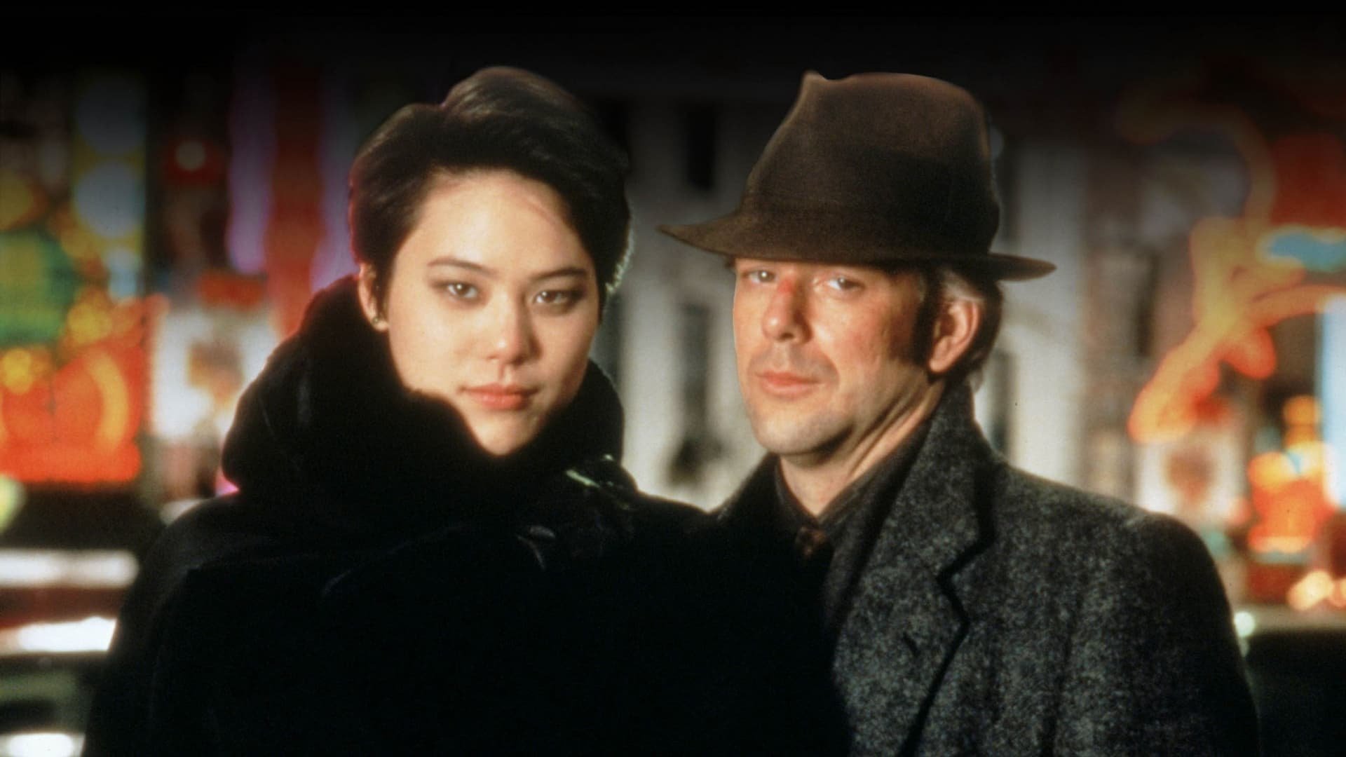 Cinematic background from Year of the Dragon 1985 - In New York, racist Capt. Stanley White becomes obsessed with destroying a Chinese-American drug ring run by Joey Tai, an up-and-coming young gangster as ambitious as he is ruthless. While pursuing an unauthorized investigation, White grows increasingly willing to violate police protocol, resorting to progressively violent measures -- even as his concerned wife, Connie, and his superiors beg him to consider the consequences of his actions.