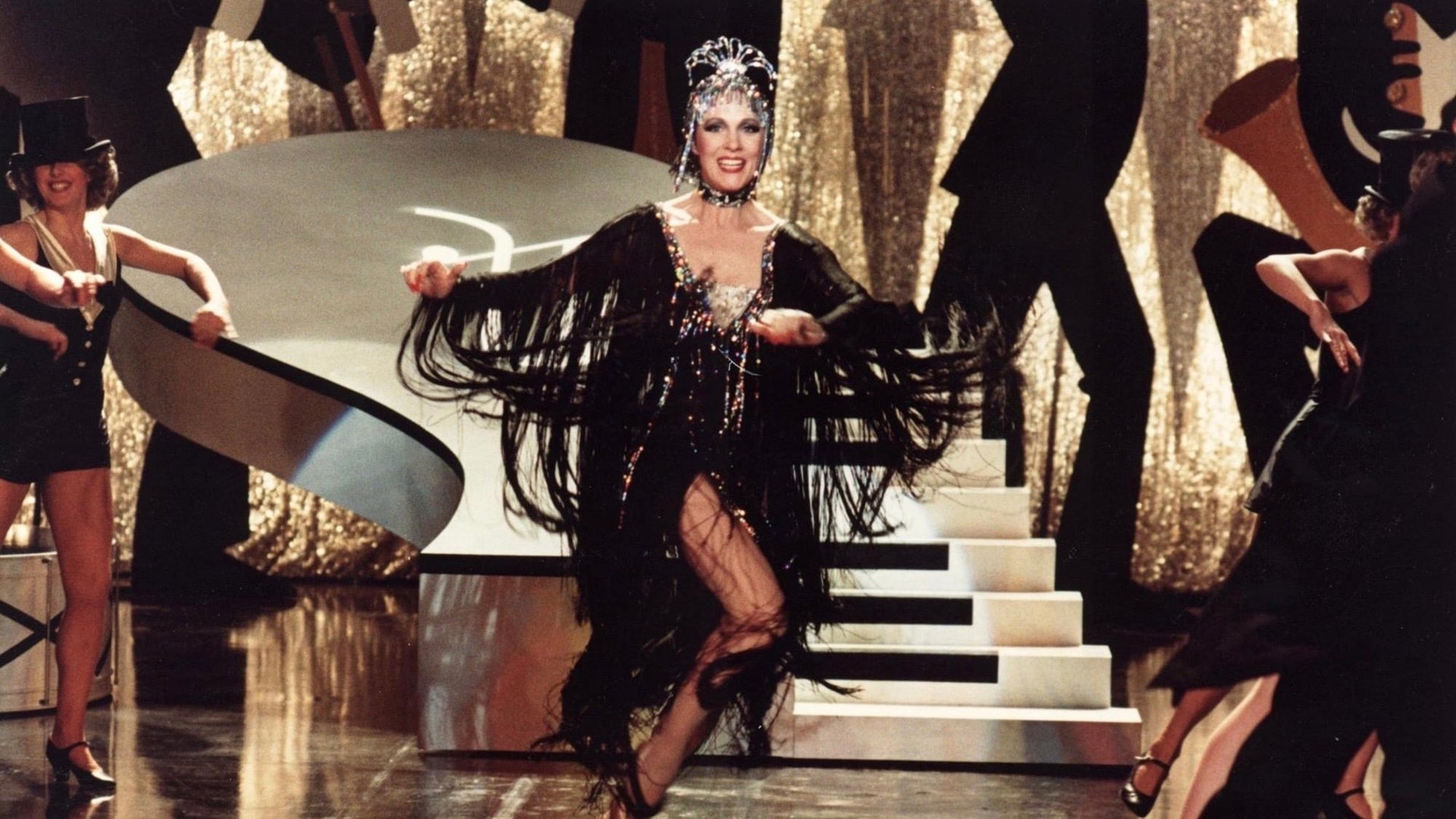 Cinematic background from Victor/Victoria 1982 - A struggling female soprano finds work playing a male female impersonator, but it complicates her personal life.