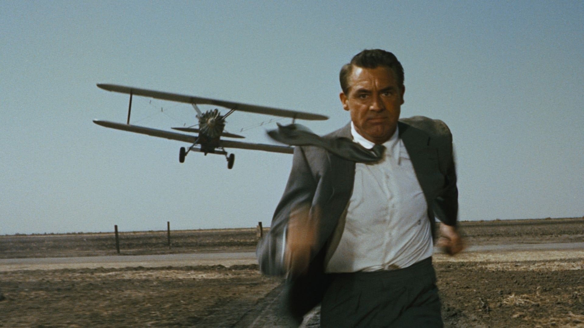 Cinematic background from North by Northwest 1959 - Advertising man Roger Thornhill is mistaken for a spy, triggering a deadly cross-country chase.