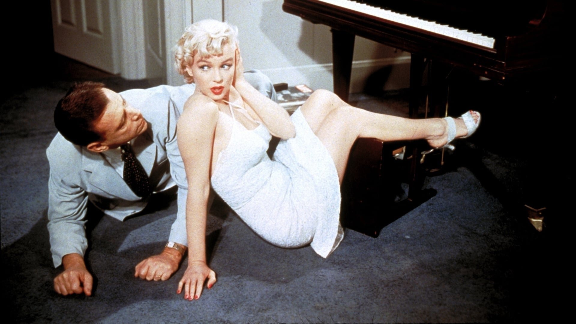 Cinematic background from The Seven Year Itch 1955 - With his family away for their annual summer holiday, a publishing executive decides to live a bachelor's life. The beautiful but ditzy blonde from the apartment above catches his eye and they soon start spending time together—maybe a little too much time!