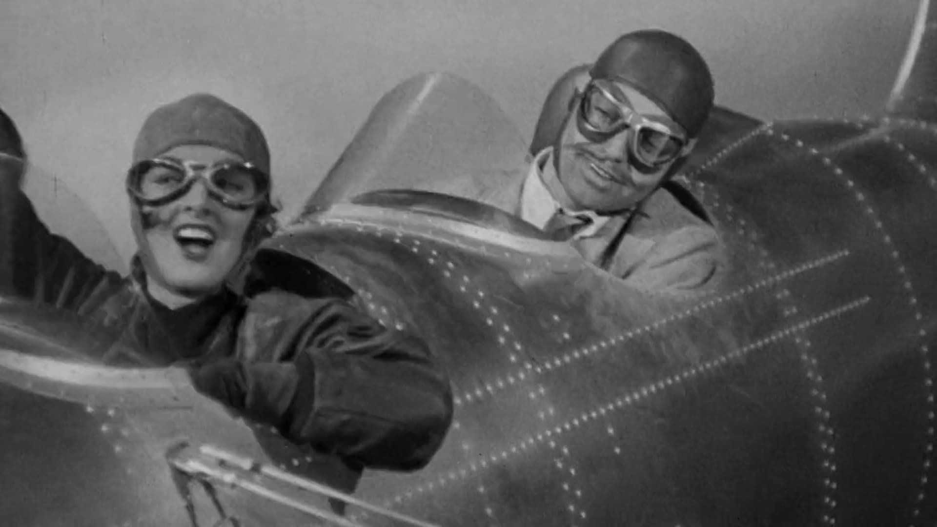 Cinematic background from Test Pilot 1938 - Jim is a test pilot. His wife Ann and best friend Gunner try their best to keep him sober. But the life of a test pilot is anything but safe.
