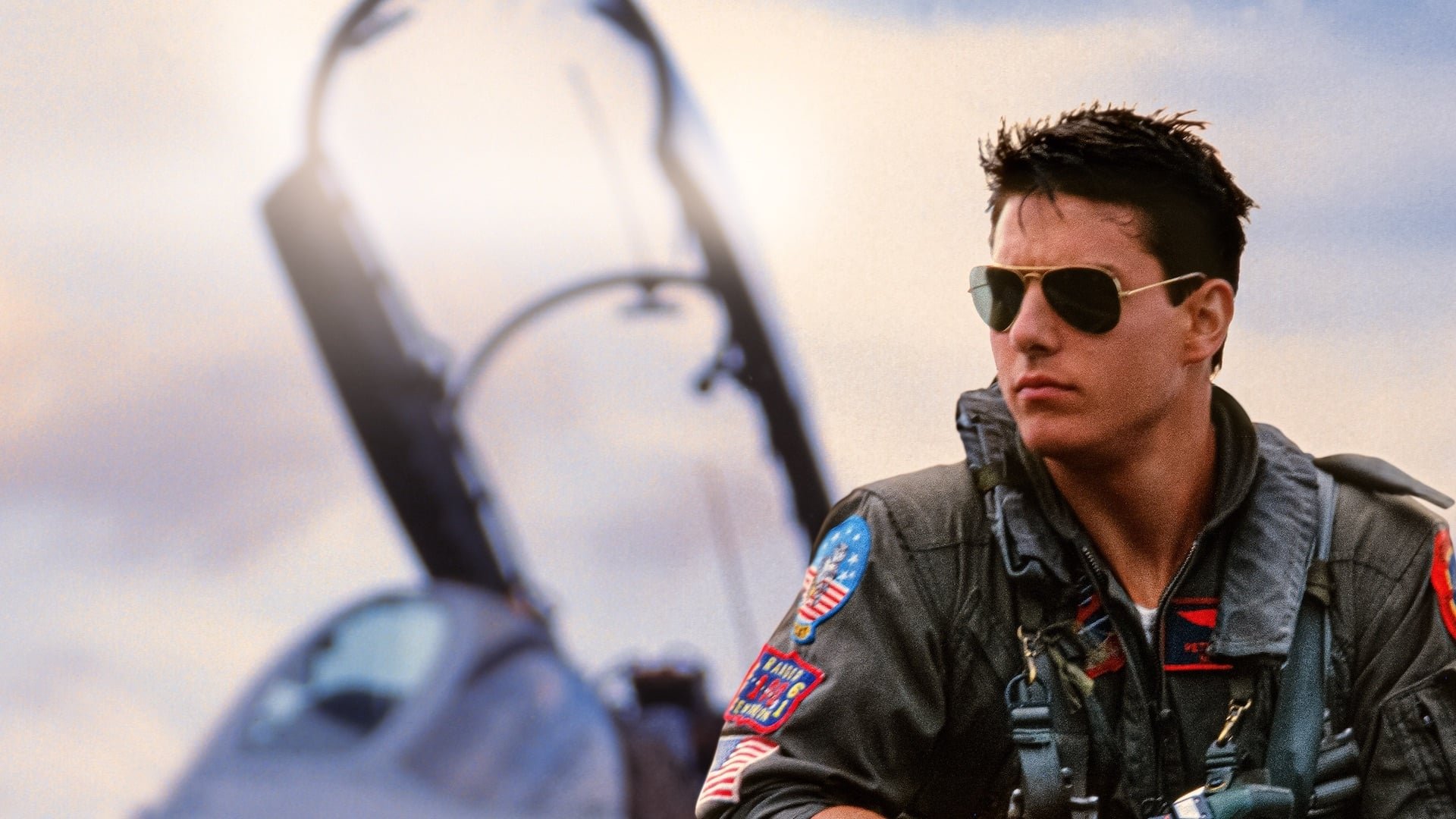 Cinematic background from Top Gun 1986 - For Lieutenant Pete 'Maverick' Mitchell and his friend and co-pilot Nick 'Goose' Bradshaw, being accepted into an elite training school for fighter pilots is a dream come true. But a tragedy, as well as personal demons, will threaten Pete's dreams of becoming an ace pilot.
