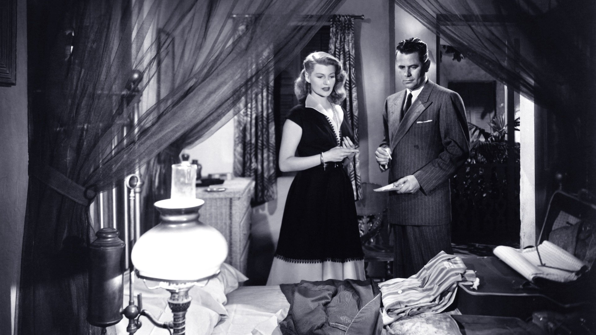 Cinematic background from Affair in Trinidad 1952 - A nightclub singer enlists her brother-in-law to track down her husband's killer.